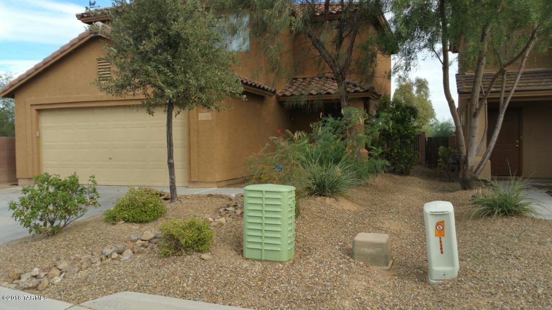 Move In by the end of the year! Tiled first floor with family room off of kitchen. Half bath with special area under staircase. 4 Bedrooms upstairs with laundry and 2 bathrooms. Covered patio with nice size backyard with grass, facing East so should be shaded during summer evenings and ready to BBQ. 2 car garage. More pictures coming soon!