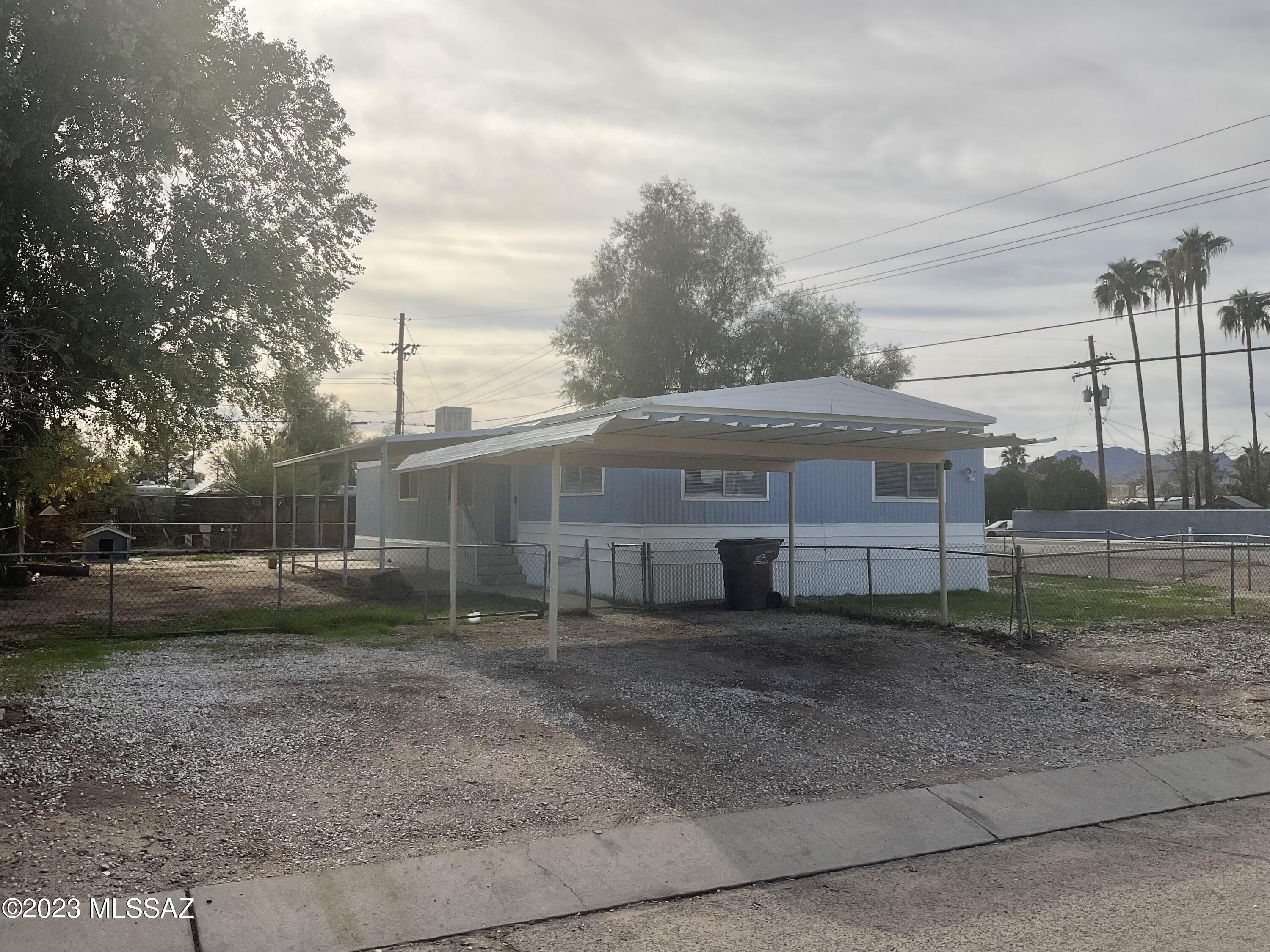 4 Bedroom / 2 Bath, 1632 soft home on large corner lot. Home features wide open floor plan with Living Rm. & Family Rm, Formal Dinning area, laminate Floors thru out, evap & A/C, completely fenced property. This is a lot of home for the price.