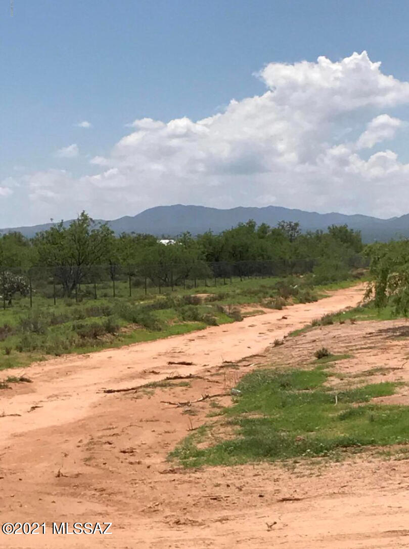 4.32 acres of potential. Property is fully fences with chain link. Has views of Baboquivari Mountains. Water and electric are at lot line. The property is near one of the proposed I-11 Routes.