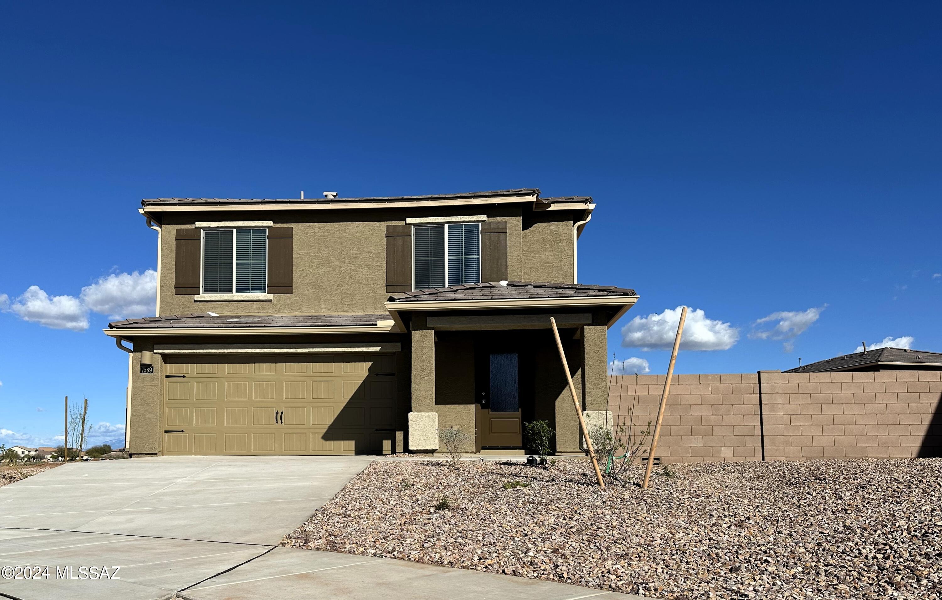 A remarkable 2-story, 5-bedroom, and 3-bath home on a gorgeous, extra large lot awaits you in the welcoming, family-friendly community of Star Valley. 

This new home is an entertainer's dream, offering an array of upgrades - energy-efficient kitchen appliances, spacious countertops, stunning wood cabinets, and a walk in pantry are just the beginning. With a spacious great room that seamlessly transitions into the upgraded, chef-ready kitchen, this home is the ideal setting for gatherings, game nights, and more. 

Additionally, guests will enjoy the comfort of a private guest bedroom on the first floor, complete with access to a full bathroom. The master bedroom is a standout, with views of 4th of July fireworks from Casino Del Sol. The additional bedrooms are also generously sized, boasting ample closet space and natural light streaming in through the windows. Find your dream home in the Palo Verde, offering space, upgrades, and style that truly make it the perfect choice for comfortable living in Star Valley.