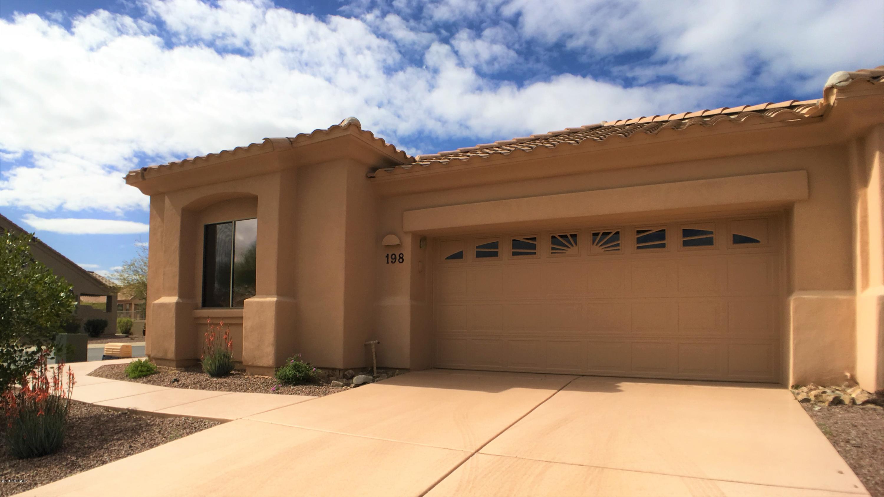 Lightly lived in 2/2 with 1516 sqft of living space, ready to move right in. Home is located in an age-restricted, gated Oro Valley community close to shopping, parks, entertainment, hospital & many golf courses. Home features an open, flowing & bright floor plan with vaulted ceilings where the kitchen opens to the great room. Split bedroom plan, both bedrooms offering walk-in closets & bath. The deep two car garage has tons of added storage & a nice work area. All the exterior concrete has a beautifully upgraded epoxy coating. HOA includes WATER, GARBAGE, SEWER, CABLE TV, FRONT & BACKYARD MAINT., MONTHLY PEST CONTROL, ROOF, STRUCTURE INSURANCE, EXTERIOR PAINT, CLUBHOUSE & GATE. The clubhouse offers TWO POOLS, SPA, BILLIARDS, LIBRARY, MEDIA ROOM, CARD ROOM, KITCHEN, & BALLROOM FOR PARTIES.