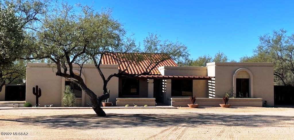 Beautiful 3 bdrm, 2.5 bath, 2231 SF,
1 acre horse property is richly covered with natural desert and majestic mesquite trees. This home is nestled in a private cul-de-sac lot at the base of the Catalinas, in the desirable Tanque Verde Valley.  The exquisitely appointed upgrades make it move in ready!  Many special features include beautiful ''slate'' porcelain tile floors in main living areas w/new carpet in formal living and 2 of the 3 bedrooms. The eat-in kitchen boasts premium granite counter tops, Stainless appliances, gas, & wet bar.  Master bdrm has beautiful hardwood laminate flooring. And includes bonus room w/closet that could easily be converted to 4th bdrm. Baths include custom cabinetry with quartz counter tops.  Newer A/C and new water heater.   See more... Upgraded light fixtures and ceiling fans throughout. Fresh exterior paint. Freshly painted masonry wall encloses yard. Pebble tec pool/spa. New roof. Views! Covered brick patio.  Flagstone set front patio with gorgeous Catalina and Rincon mountain views. Two car garage with built in shelving and extra space for storage. Neighborhood paving project to start in February according to the neighborhood group. Please verify with Pima County! Won't last long!