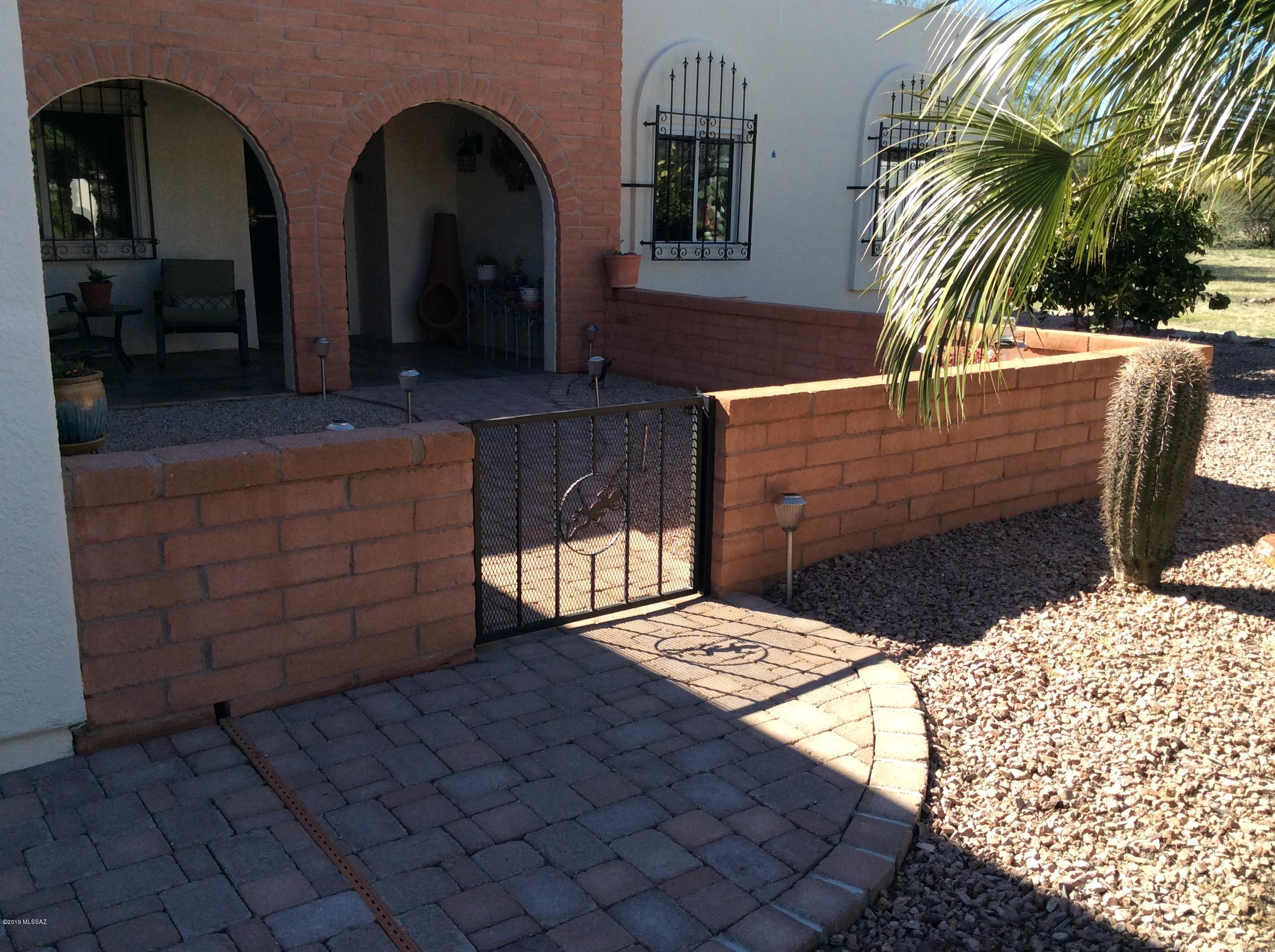 Exceptionally well maintained home situated in the open spaces of Country Club North w/lots of common area separating residences.  TRIPLE PANE WINDOWS and shutters throughout!  You'll want to spend  your extra time in the spacious, superior screened porch boasting custom iron works, ceiling fans & tiled flooring.  Hall bath completely remodeled in 2015 w/granite counters & tiled shower in neutrals.  New A/C in 2011.  Remodeled kitchen w/updated cabinets, counters & appliances!  Eat-in kitchen w/extra counter space & cabinetry.  Solar hot-water heater.  Roof re-coated in 2018, exterior repainted in 2019.  Your guests will feel welcomed from their first glimpse of the front bricked patio!   You'll love calling this home ''mine''!