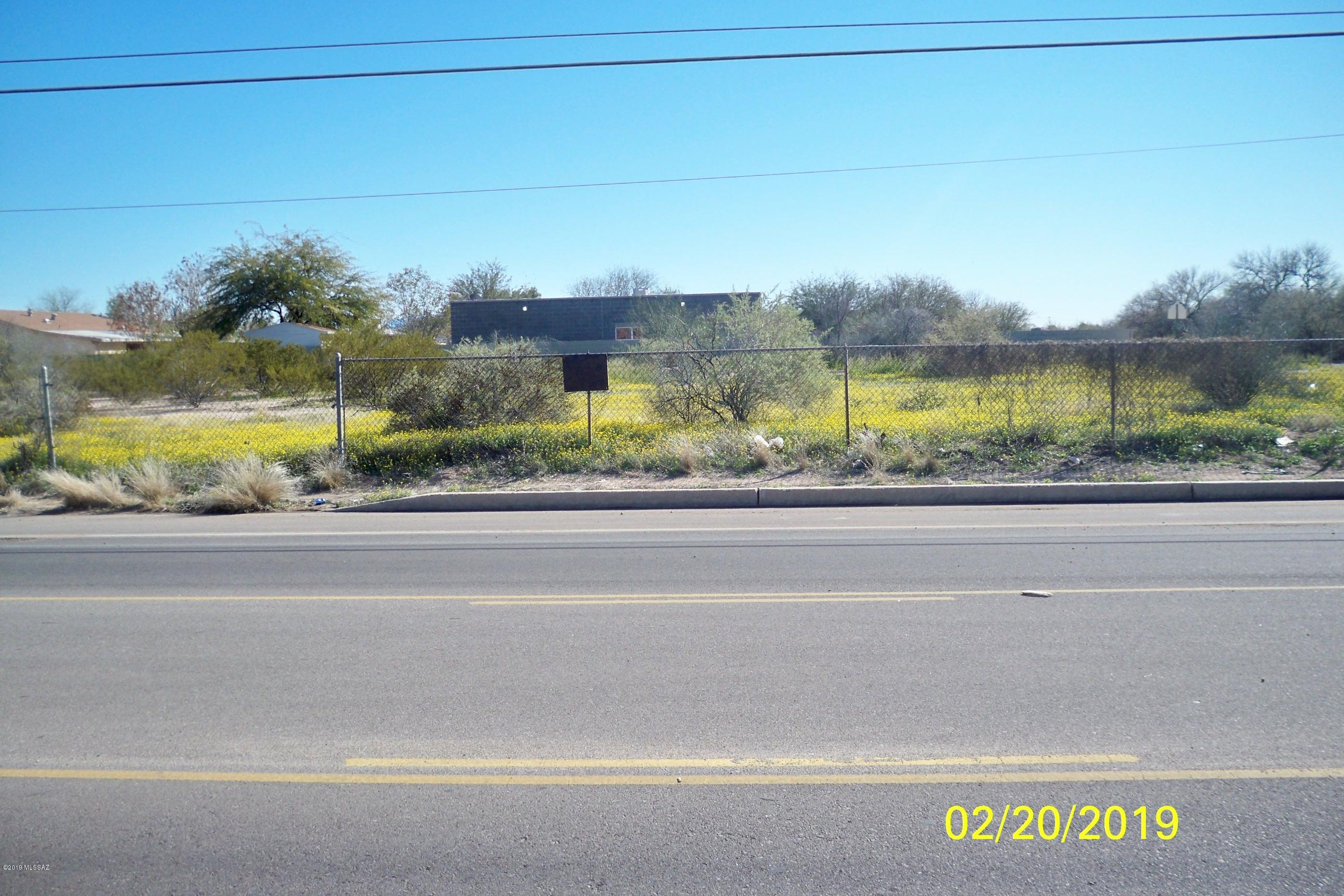 Flat parcel already consisting of two lots, potential to split into  four residential lots for new builds!       New 3 units  or 4 units could also be built on this site with development plan approval.   Subject has one water meter on the property, electric and gas at the lot line.