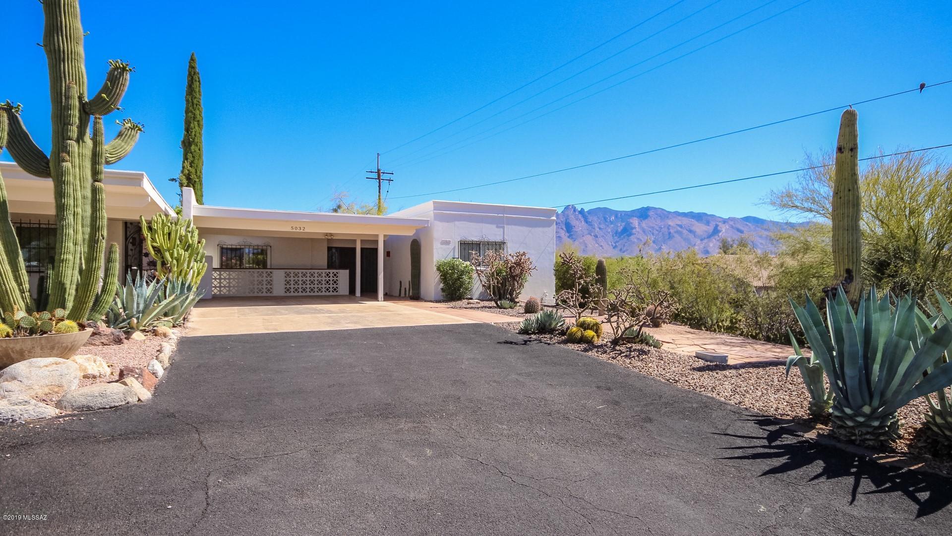 Stunning 3 bedroom 2 bathroom townhome with beautiful mountain views located in a Northridge Estates Community. Townhome features an abundance of natural lighting with a custom color palette throughout. Kitchen includes custom cabinetry with white appliance and ample counter space. The master suite includes room for a sitting area and private exit to the sun-drenched Arizona Room! Enjoy time on your patio taking in the mountain views with those closest to you. Don't let this gem pass you by!