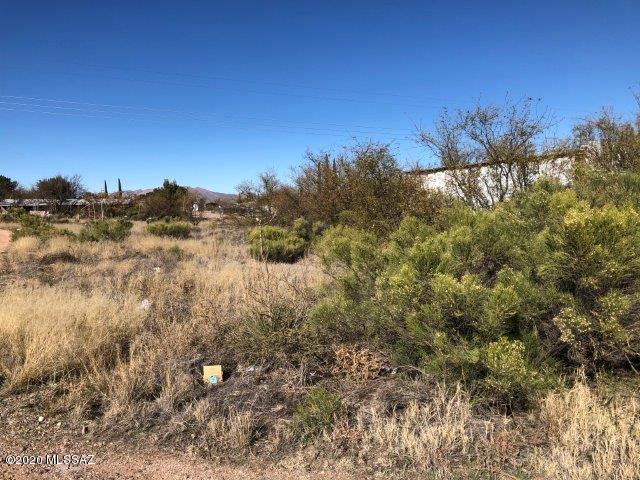 Commercial lot in Mescal Lakes across the road from a new Dollar General Store, and behind the Quick Mart Store. Lots of potential for any type of business. Mescal Water and electric available.