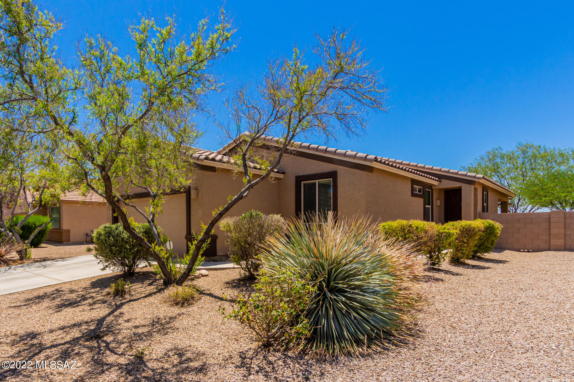 Well Maintained Home in San Lucas! Explore the Interior highlights including 3BRs, 2BAs plus a den/office in a split bedroom plan; spacious Primary Bedroom with ensuite, w/dual sinks, and a walk-in closet; beautiful cabinets, granite counters, pantry closet, and stainless steel appliances in Kitchen; ceramic tile and laminate flooring in all wet areas; carpeted bedrooms; freshly painted; carpeted bedrooms; spacious open great room with dining area, and a convenient breakfast bar; and a 2 car garage with built-in workbench and vice. Newer water heater, recent termite treatment with 5 year transferrable warranty.  Enjoy outdoor living in your large backyard with a covered patio, charming pergola, cozy fire pit, and low care landscaping! Relax in your hot tub while watching the big game on your patio TV. Take advantage of clear skies and bright stars in the San Lucas Community which features walking trails, a big community park with basketball court, sand volleyball, baseball field, dog park, and playgrounds. Great location just minutes away from 1-10 and easy access to shopping, dining, entertainment, Outlet mall, and schools.