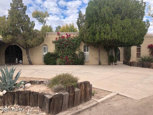 Large (2,484 sf) 4 bedroom, 3 bath with mother-in-law quarters on a quarter acre. Non-subdivided so no HOA. Convenient central location. Verdant garden with mountain views. Property being sold AS-IS.