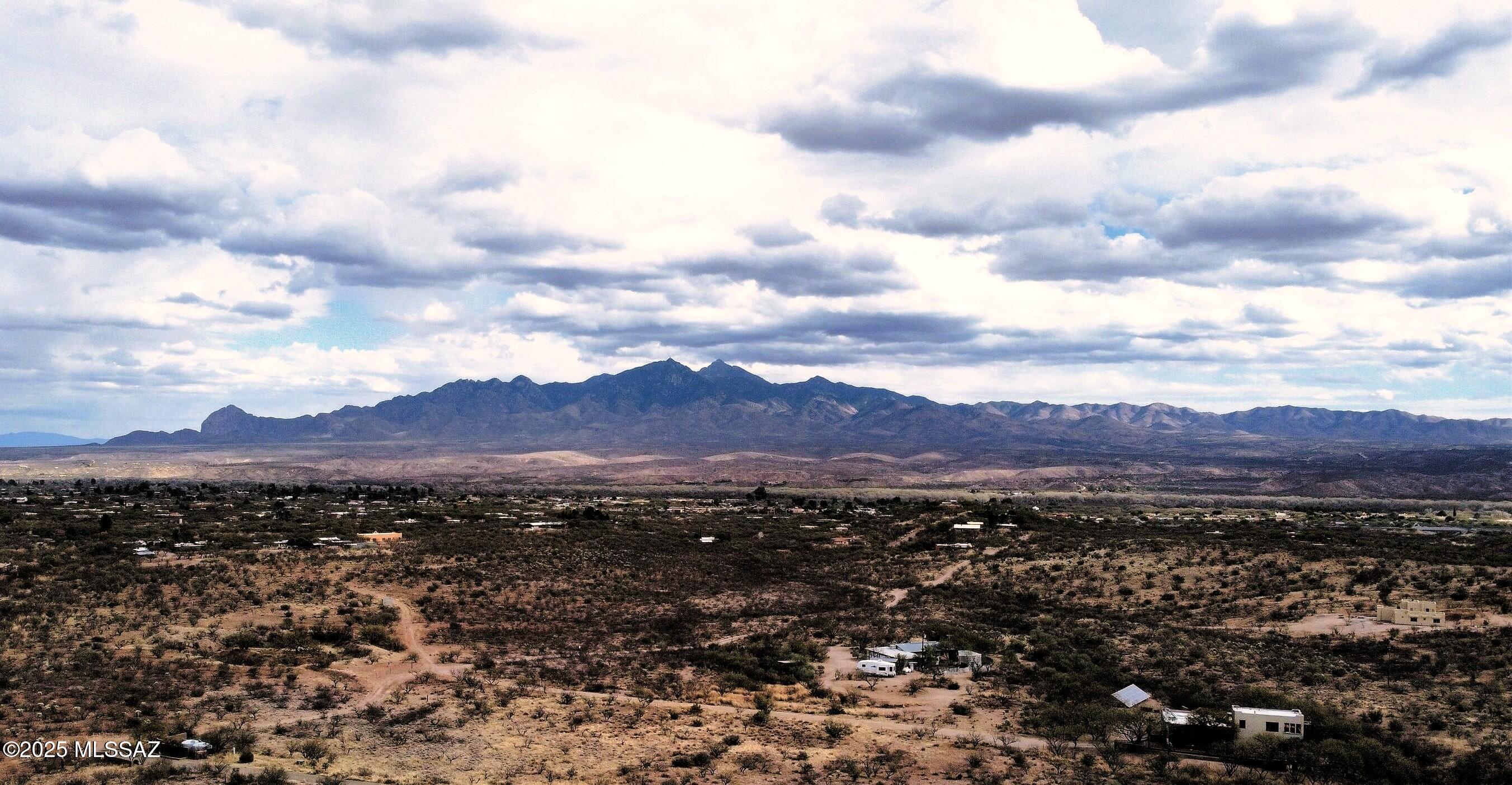 Build your Dream Home on this 4.16 Acre lot with STUNNING PANORAMIC VIEWS in every direction of all three mountain ranges Santa Rita, Tumacacori and San Cayetano. Electricity and water underground at the lot line. NO HOA. Lot is surveyed and staked. Shared well with 5 parcels. Septic required. Choose your own builder and your time frame. Only minutes away from Historic Tubac, Tubac Golf Resort, galleries and shopping.