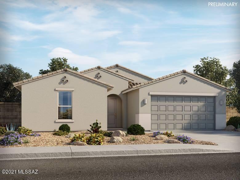 Brand NEW energy-efficient home ready July 2022! Modern Rustic Design Collection - Large homesite - Gourmet Kitchen. Sip your morning coffee from the covered back patio. Inside, the kitchen island overlooks the great room and adjacent nook. The private primary suite is tucked away from the secondary bedrooms and features dual sinks and large walk-in closet. Homeowners at Arbor at Madera Highlands can enjoy the established amenities in the community, including a pool, playground, and walking trails. Known for their energy-efficient features, our homes help you live a healthier and quieter lifestyle while saving you thousands of dollars on utility bills.