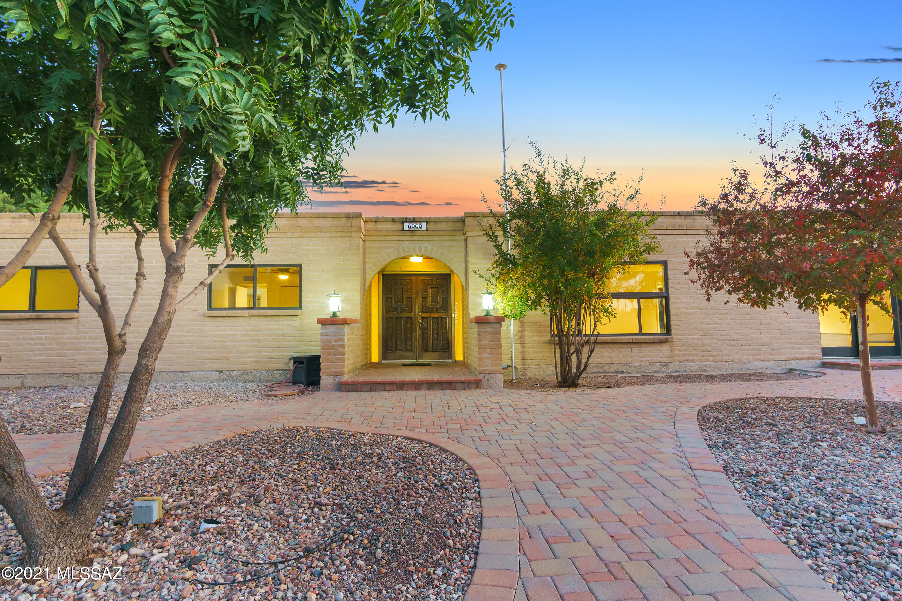 Make Lifelong Memories here in this Mid-Century Charmer!* This 4 Bedroom/3 Bath home is on a very large lot in a quiet cul-de-sac; just a wonderful pocket in coveted El Gheko Neighborhood.  A few vintage features remain, but important updates have been done: pool plaster, tile, pump, filter & cool decking. Newer Milgard windows and doors throughout, freshly painted everywhere.  Brand new carpet in the bedrooms. The front courtyard is the spot to be mesmerized by Catalina Mtn Views. A double door entry opens to a foyer and spacious living/dining area. Walls have been removed to create a super sized Kitchen w/cabinets & counters galore. The nearby laundry rm is huge w/lots of storage & central vac station. Pool Door gives quick access to the 3rd Bathroom. Kitchen opens to the Family Room... with a quintessential mid-century style fireplace.  Large wood encased slider doors offer natural light and a view of the sparking pool.  3 large rain catchments help to water the fruit trees. Workshop and more storage in the garage.  Masonry construction and N/S exposure help keep this home temperate.THEY JUST DON'T BUILD THEM LIKE THIS ANYMORE!