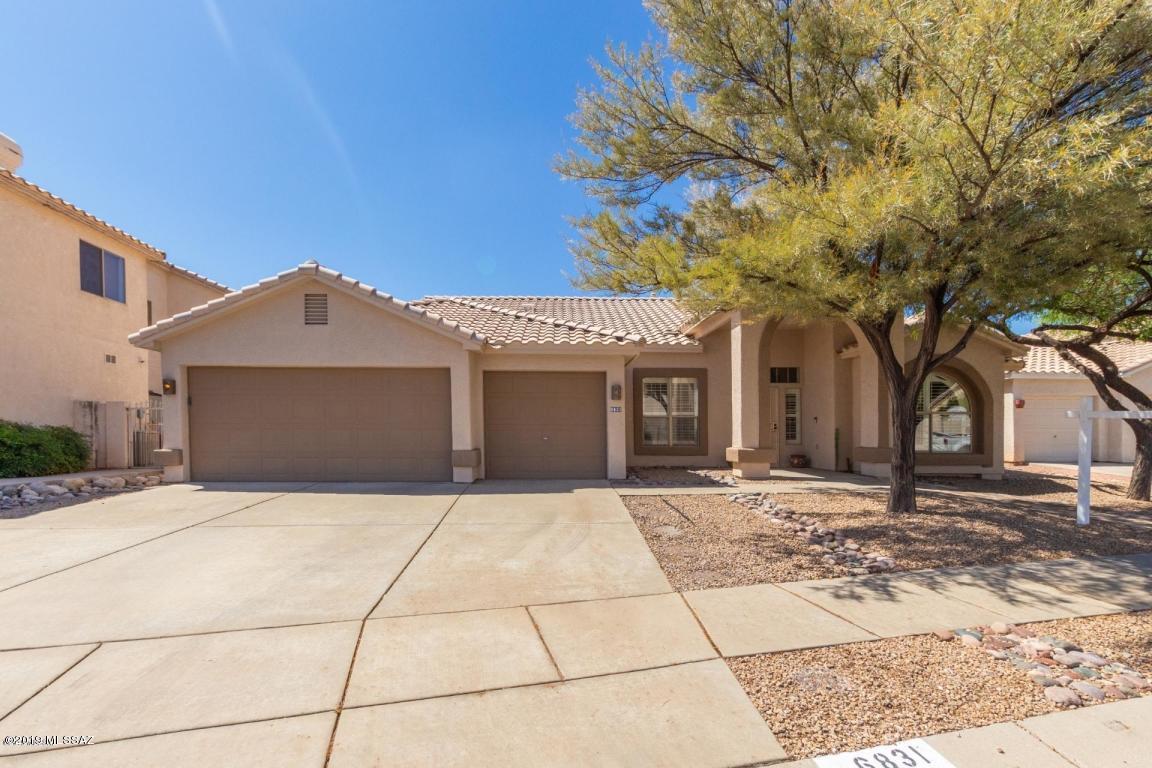 Continental Ranch 4 Bedroom/2 Bathroom home in Marana Schools with 3 car garage. Updates throughout including brand new paint and carpet, vaulted ceilings, ceramic tile flooring, central air conditioning, open floorplan & neutral color tones with an abundance of natural lighting. The kitchen has wood cabinetry with stainless steel appliances, double oven & large island/breakfast bar, master BR suite with huge walk-in closet, private bath, double vanity, soaking tub, & separate shower. Well manicured yard with mature trees & gravel. Includes access to Community Pool and Rec Center. 1yr minimum Lease, $45/adult Application Fee, $1975 Security Deposit, $150/pet Pet Fee with approved pet, $300 cleaning fee. Available immediately. Text 520-250-8986 for more info and to schedule a showing.