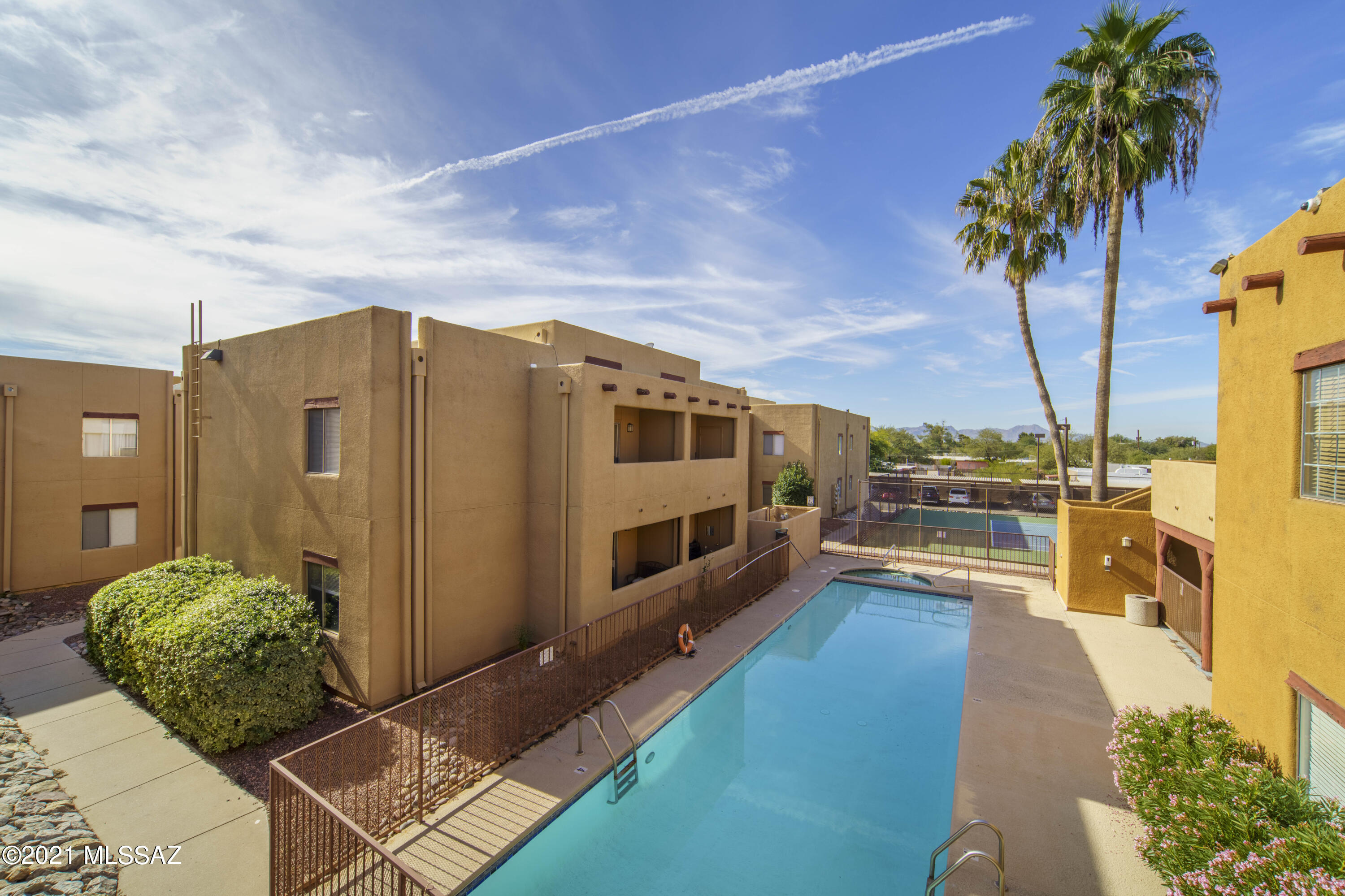 Welcome to this one of a kind, fully furnished condo centrally located in close proximity to downtown Tucson, University of Arizona, hospitals, restaurants, shopping, hiking trails, schools and everything Tucson has to offer! This property is an amazing investment opportunity or a perfect full time residence, offering a sparkling pool view from the charming patio, upgraded lighting fixtures, washer/dryer(in one), stainless appliances, a light, airy feel complete with tasteful furnishings...all you have to do is move in! The clubhouse is just steps away and features a rec room, laundry facilities, exercise equipment, tennis/ basketball courts and a large pool. Schedule your showing today!
