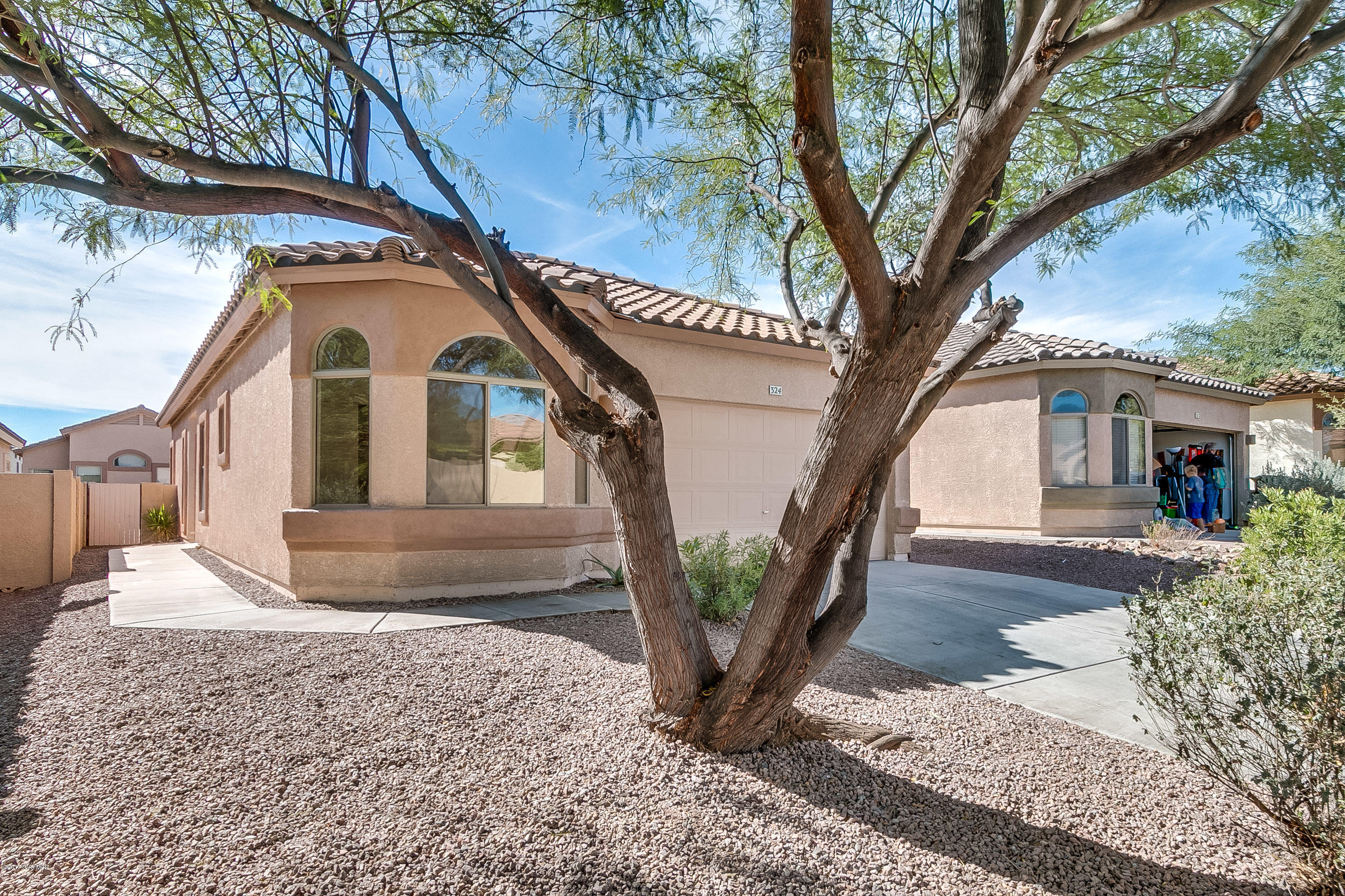 Your search is over! This is ''THE ONE''! Beautifully updated home located in Rancho Sahuarita with all the wonderful amenities included. You'll be delighted as you step in on the BRAND NEW vinyl-plank wood flooring. Freshly painted throughout, you'll enjoy the NEW MODERN DECOR. In the kitchen, you love the newly refinished painted cabinetry, new counter tops, new microwave and huge breakfast bar island. Open Great room and split bedroom floor plan with FOUR bedrooms. Vaulted ceilings throughout add to the open feeling. Low maintenance backyard and new rock in the front. SMART PANEL is ready for all your SMART HOME TECHNOLOGY! Neighborhood park is just down the street. This one will not last!