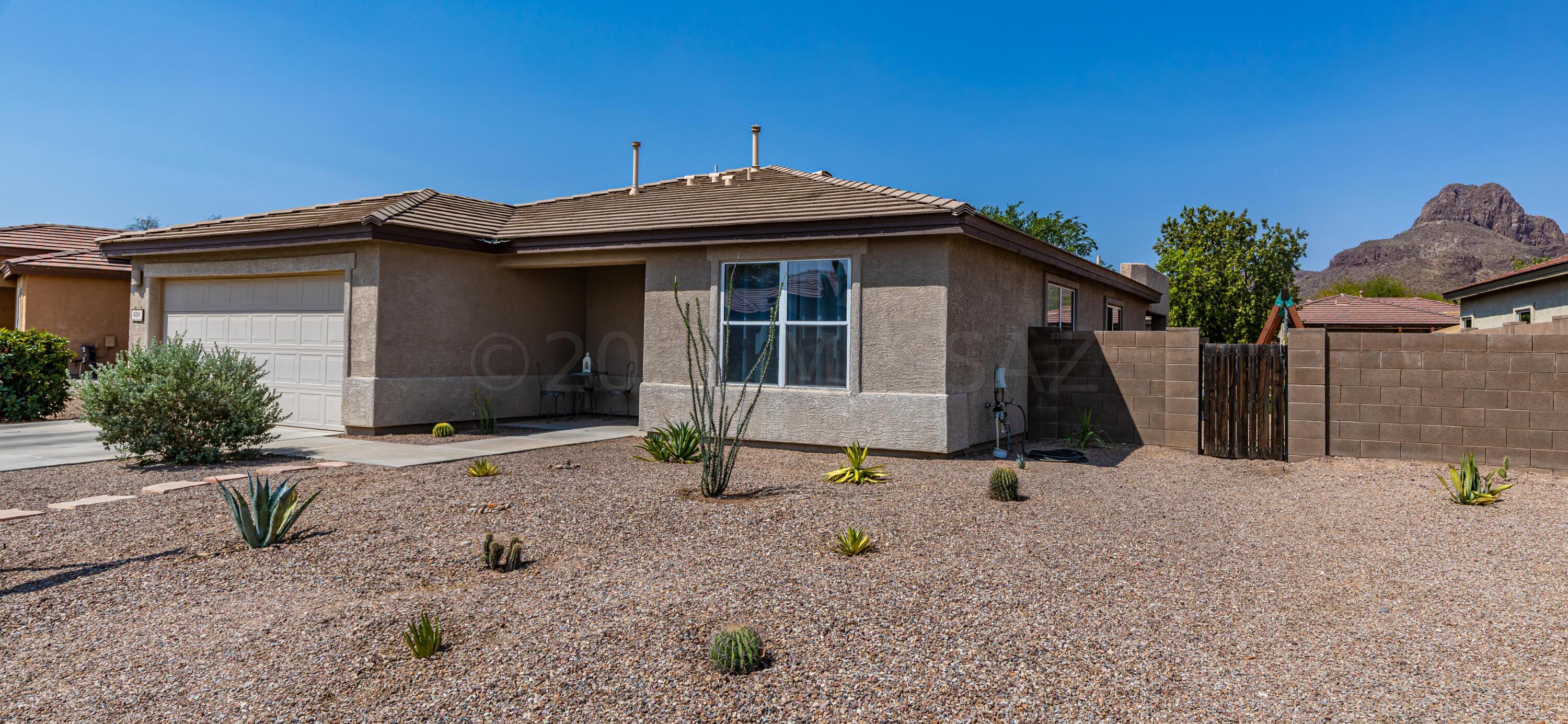 Immaculate 4 bed, 2 bath home in desired Continental Reserve community. Home features a large lot with a sparkling pool, above ground spa, swing set, new landscaping including new artificial grass. Pool has new custom solar thermal cover. Inside home features a spacious open floor plan perfect for entertaining.  Bright open kitchen  concept with new stainless steel appliances, eat-in nook, breakfast bar, granite countertops, large island, and loads of cabinet space. New front load washer and dryer and new fixtures and hardware throughout the house.  Owner just did $14k in upgrades.  Master bedroom has a huge walk-in closet. This home is close to great schools, parks, hikes, restaurants, grocery stores, and the I-10. This home is waiting for you to come and enjoy the Tucson lifestyle.