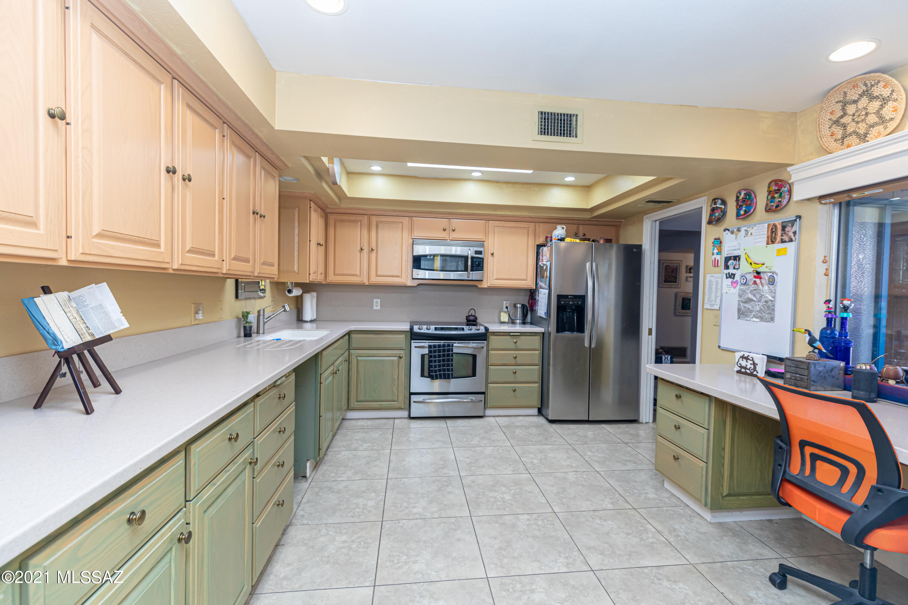 Fantastic opportunity to own a centrally located 2 bedroom, 2 bath townhome.  Set in a serene cul-de-sac, near community pool & BBQ. Tile floors throughout, contemporary fireplace, accordion patio doors that allow the cool fall breeze to come through. Spacious kitchen features corian countertops, stainless steel appliances and desk. Back patio has built-in concrete planters, landscape lighting. Garage features a  new mini-split HVAC and a utility sink. Close to Tucson Mall, restaurants, within minutes to downtown Tucson and University fo Arizona.

CC & R's do not allow rentals in this community.