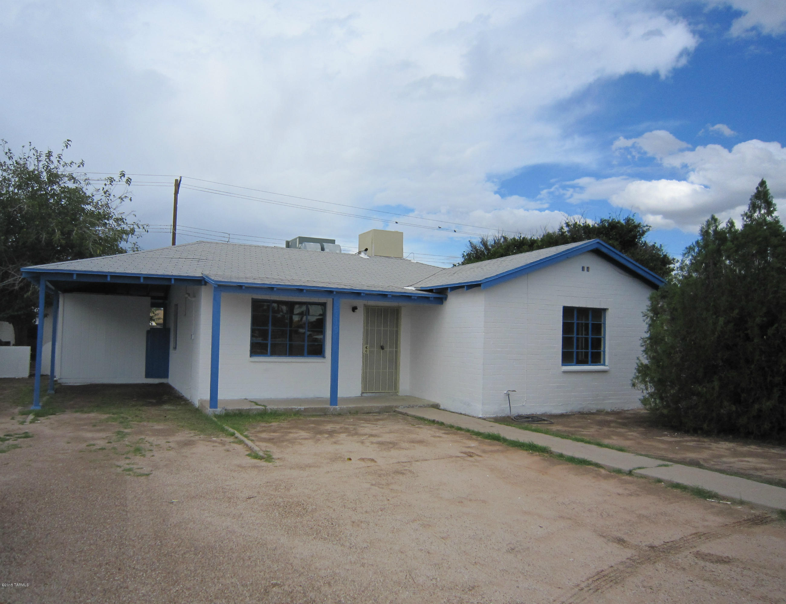 Great location for office use compatible with O-3 Zoning or residential use. 3Br 1 Bath Home has 03 Office Zoning on 22nd Street just West of Country Club.   New Carpet & Freshly Painted Inside and Out! Large walled yard with separate workshop and storage. Rear access from alley. Great location for office use compatible with O-3 Zoning or residential use. Property has Central AC PLUS Evaporative cooling.
