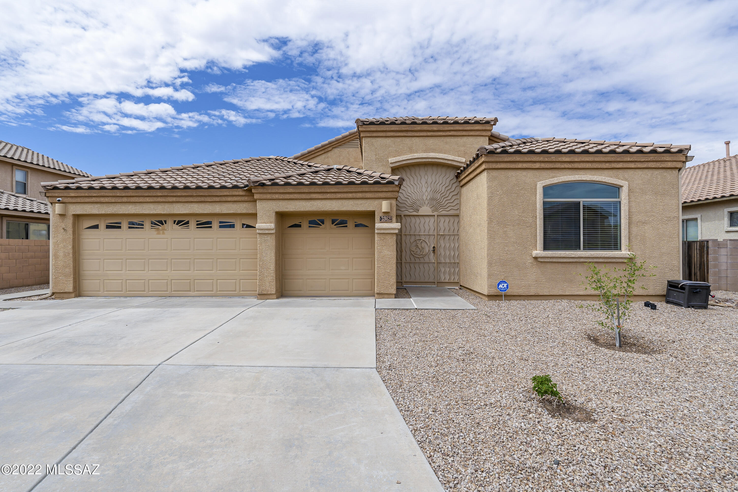 SELLER OFFERING $2,500 IN CONCESSIONS. CAN BE USED TOWARDS BUYERS CLOSING COSTS OR TO BUY DOWN YOUR INTEREST RATE! Stunning 4 bedroom 2 bath single story home with 3 car garage. Inside discover the open floor plan, spacious great room, eat in kitchen with separate dining area and an additional family room/den. The kitchen boasts granite countertops and plenty of cabinetry/counter space, stainless steel appliances and a breakfast bar. The spacious laundry room contains overhead cabinetry and plenty of additional storage space. The large primary suite has its own access to the patio, double vanity, a garden tub, walk in shower and a spacious walk in closet. NEW AC June 2022, water heater installed 2020. Remarkable backyard with a large extended covered patio, additional retractable awning.