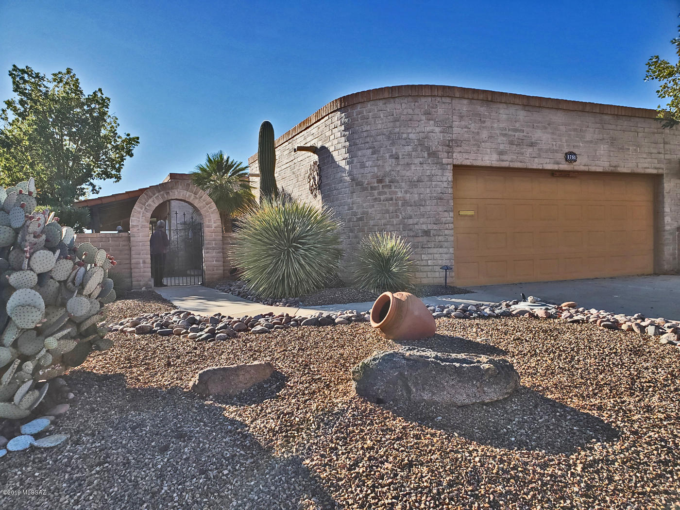 Wow!  Come see this 2-bedroom, 2-bath, turn-key home in Desert Hills V.  Located on a prime lot, this popular Miramar has a great mountain view.  It features 2,050 sq ft, 2 beds, 2 baths, spacious eat-in kitchen, great room, fireplace, den, and a 2-car garage with ample storage.  The house boasts tasteful Southwest décor, and updated kitchen and baths with granite counters. 

The rear patio is the perfect place to enjoy your morning coffee or evening cocktails.  And what a great place to host a gathering of family or friends!  Conveniently located near golf and GVR facilities—a great winter residence, year-round home, or investment property.