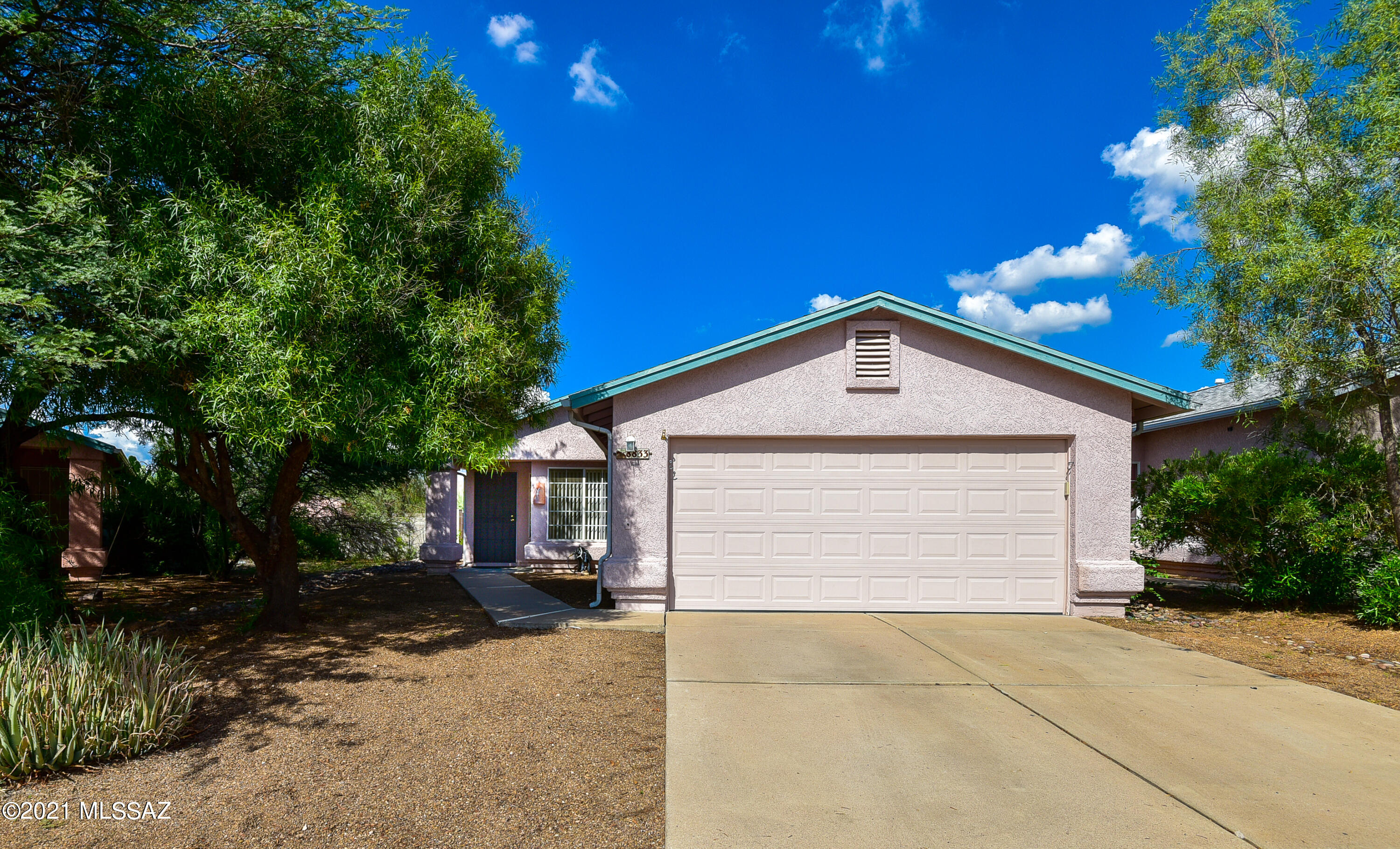 Range Priced. Seller will accept or counter offers between $250,000 & $260,000. Welcome home to this beautifully maintained 3 bed/2 bath home that is truly turn-key & ready for you. Located at the end of a cul-de-sac  in a superb east side neighborhood with an ample amount of open space behind the backyard. Inside you will find natural light streaming into the spacious living area with easy care ceramic flooring and a clean & bright kitchen & dining room. Newer carpet in the bedrooms, a large laundry room and 2 car garage tie this home up into a nice & tidy bow! You have all the boxes checked, plus new plumbing, new main water line and a new HVAC was installed in 2017. Visit today & get ready to move!