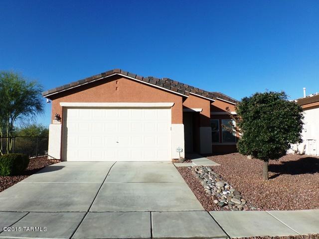 Charming Eastside Home located close to DMAFB, shopping, dining and entertainment! This 2 bedroom, 2 bath home comes complete with all kitchen appliances and washer/dryer. Open and airy floor plan. Includes an extra room that can be used as a den/office. Very private end lot located close to walking paths. Alarm system already installed (tenant to activate). Split bedroom plan. Covered back patio with majestic mountain views. Spotless 2 car garage! Sorry, no pets preferred. Please call to schedule a viewing at this clean, rent ready home!