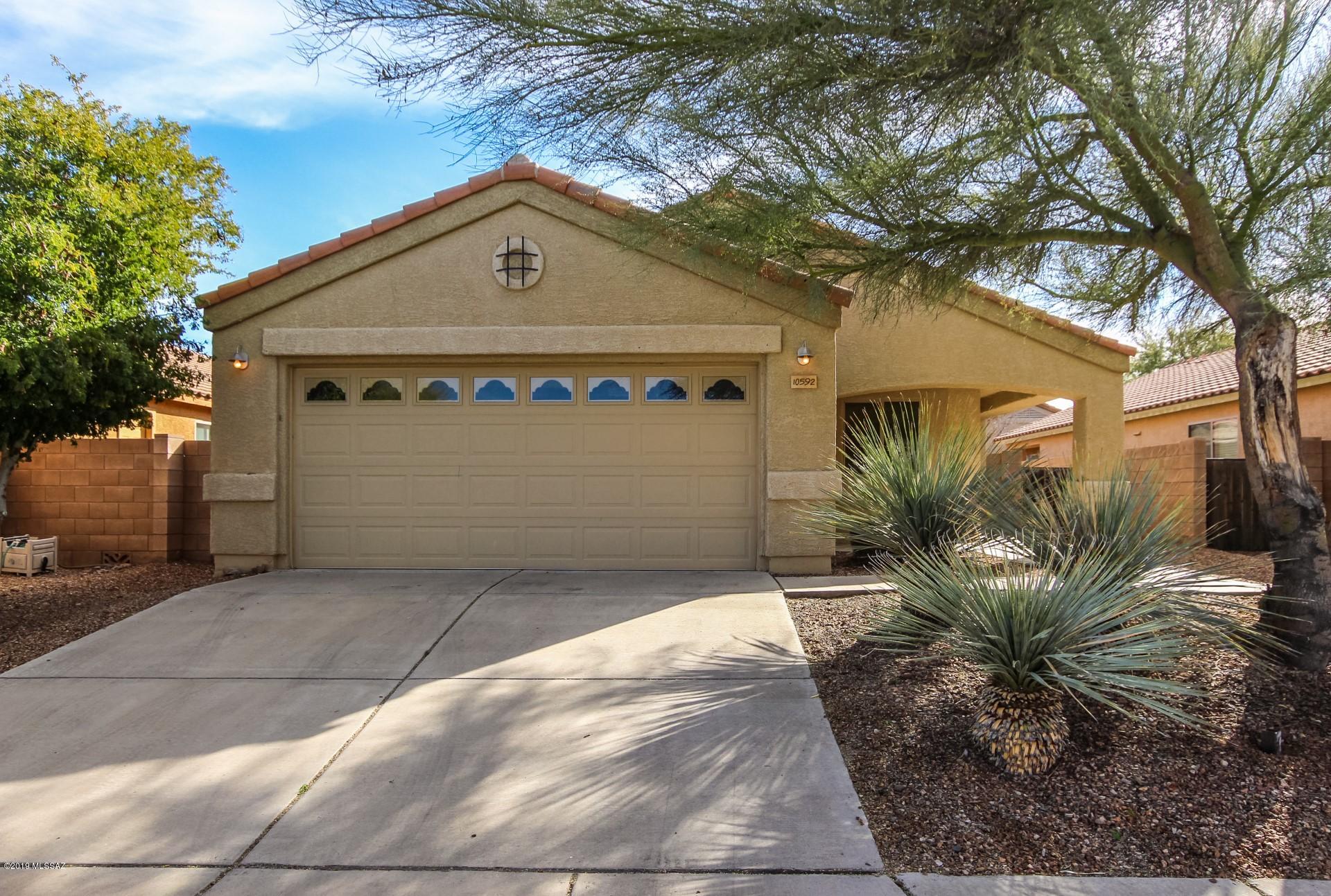 Clean and move-in ready home in highly-desirable Desert Willow Estates. Located in the Vail School District, this home is only steps away from the neighborhood park. Enjoy the open concept floorplan, upgraded kitchen, new stainless steel appliances, vaulted ceilings, fresh paint and carpet, and split bedroom floor plan. The master suite has a large bathroom with dual vanities and a walk-in closet. There is so much to enjoy in this home, including mountain views from the front and back. Come. See. Stay!
