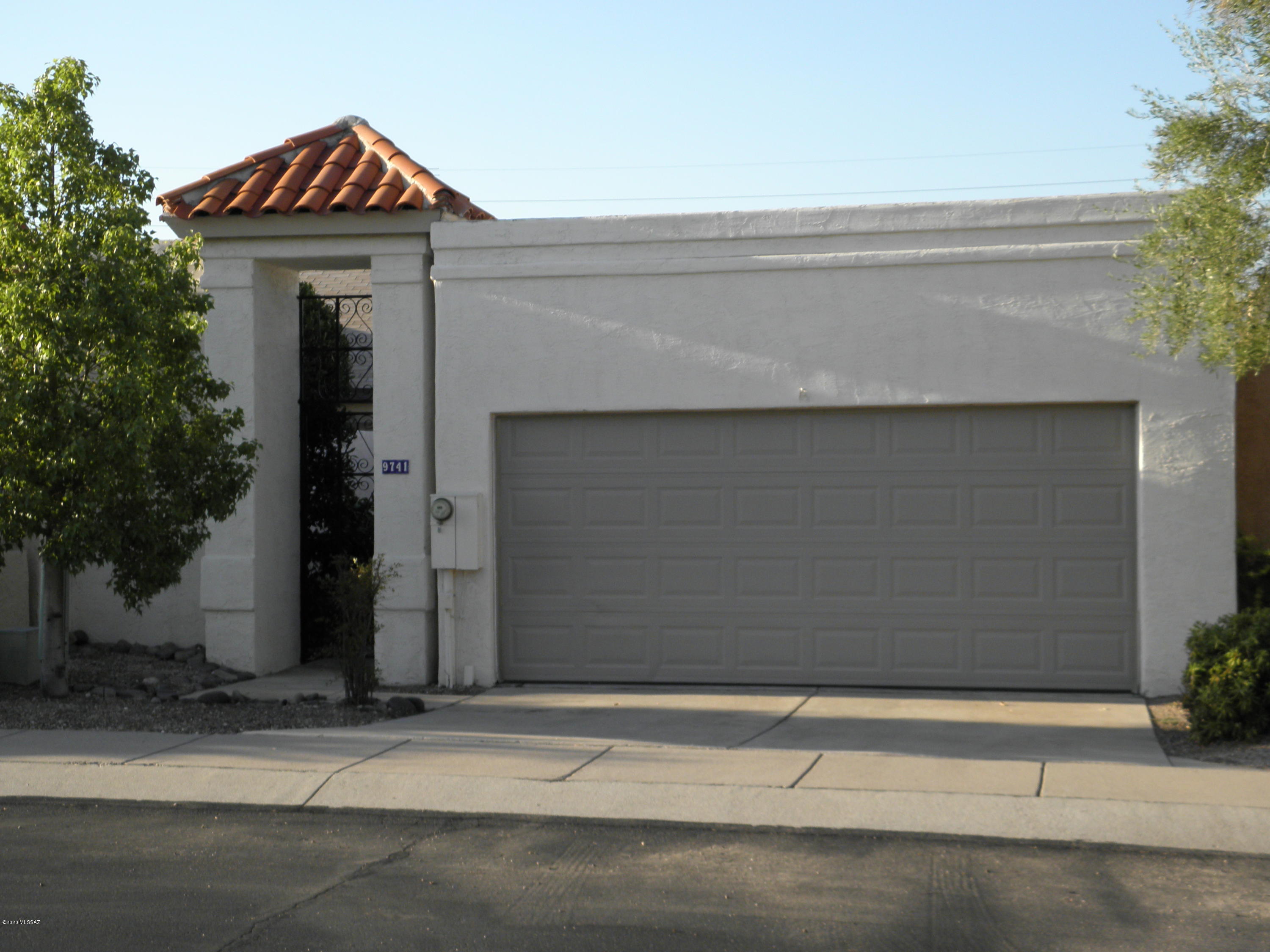 You're going to love the quiet community of MIramonte. Freshly painted interior with plantation shutters, cathedral ceilings, great room with a  northern exposure. The private high walled brick paved patio with large aluminum patio cover makes this backyard an oasis perfect for relaxing with mature professional landscaping to appreciate. Each of the two bedrooms has its own bathroom.  The large two car garage completes the package.  Location is in the tranquil eastside., 45 minutes to top of Mount Lemmon, A few miles East on Speedway to Saguaro National Park East  where you have a multitude of hiking trails into the beautiful desert of the Rincon Mountains. Or out of town guests will enjoy the Tanque Verde Guest Ranch established in 1868 for dinner or  drinks on their patio. Welcome home.