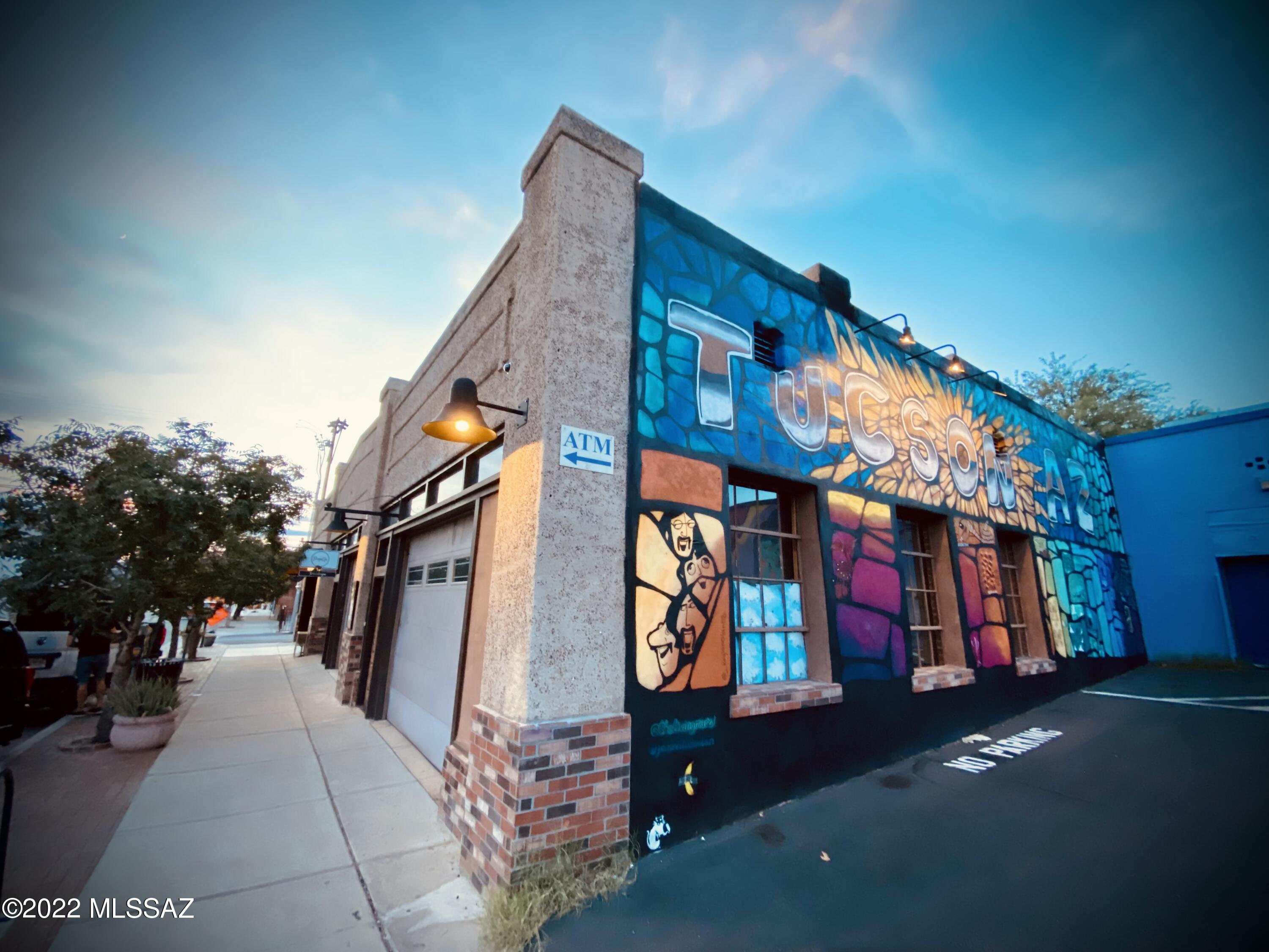 Own a piece of The Heartbeat of Tucson, Historic 4th Avenue, and earn income! One of the coolest spots and lease properties in the Downtown area is now on the market! At over 5100 sf and three tenant spaces, this beautiful property is sure to be an income producer for years to come, as 4th Avenue continues to thrive as a tourist destination, local nightlife hotspot, with daily pedestrian shoppers and an over 7000 average daily traffic count. Tenants consist of hip merchants; 1972 Barber & Shave Parlor, ShopUp Tucson Vintage Shop, and Cave Paper, in business since 1994. Features include brick interiors, bowstring truss ceilings, roll-up doors, polished concrete floors, 2-year old MasterCool at each unit, and electric metered separately, no gas.