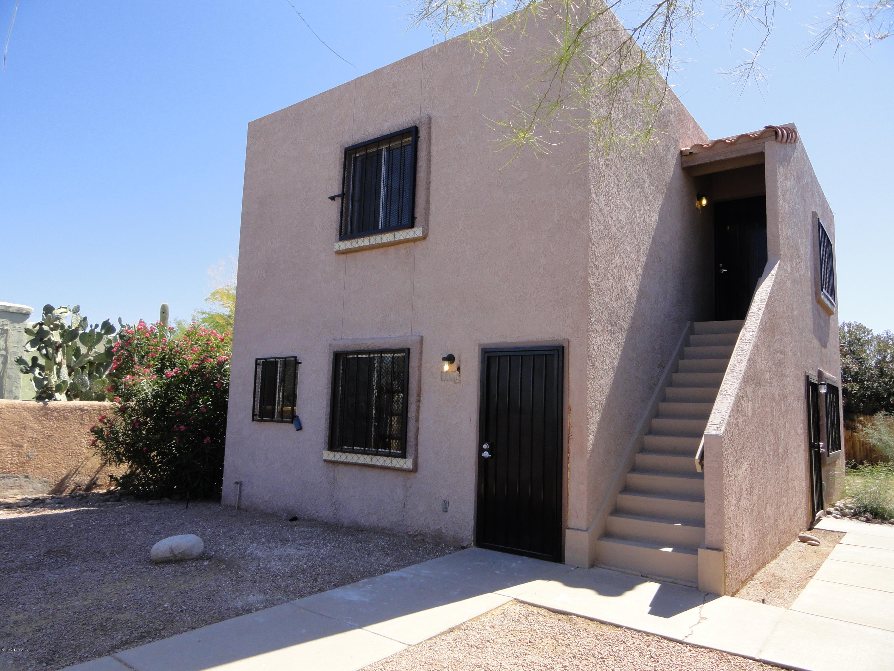 Great Investor Opportunity in Central Tucson. There are (2) Studios units and (1) One Bedroom unit in this conveniently located Tri-Plex which is near shopping, bus lines and the UofA.  Rent all 3 units or live in one and rent out the other 2.   The great condition means LOW OVERHEAD.  Along with updated kitchens and baths, some of the recent renovations include new water heaters in all units, roof re-coat, security metal on all doors & windows, freshly painted and new carpet in 1 bedroom unit.  Mini-split systems in each unit.  Fenced low-care yard.  Plenty of off-street parking.  Individual electric meters with shared water meter.