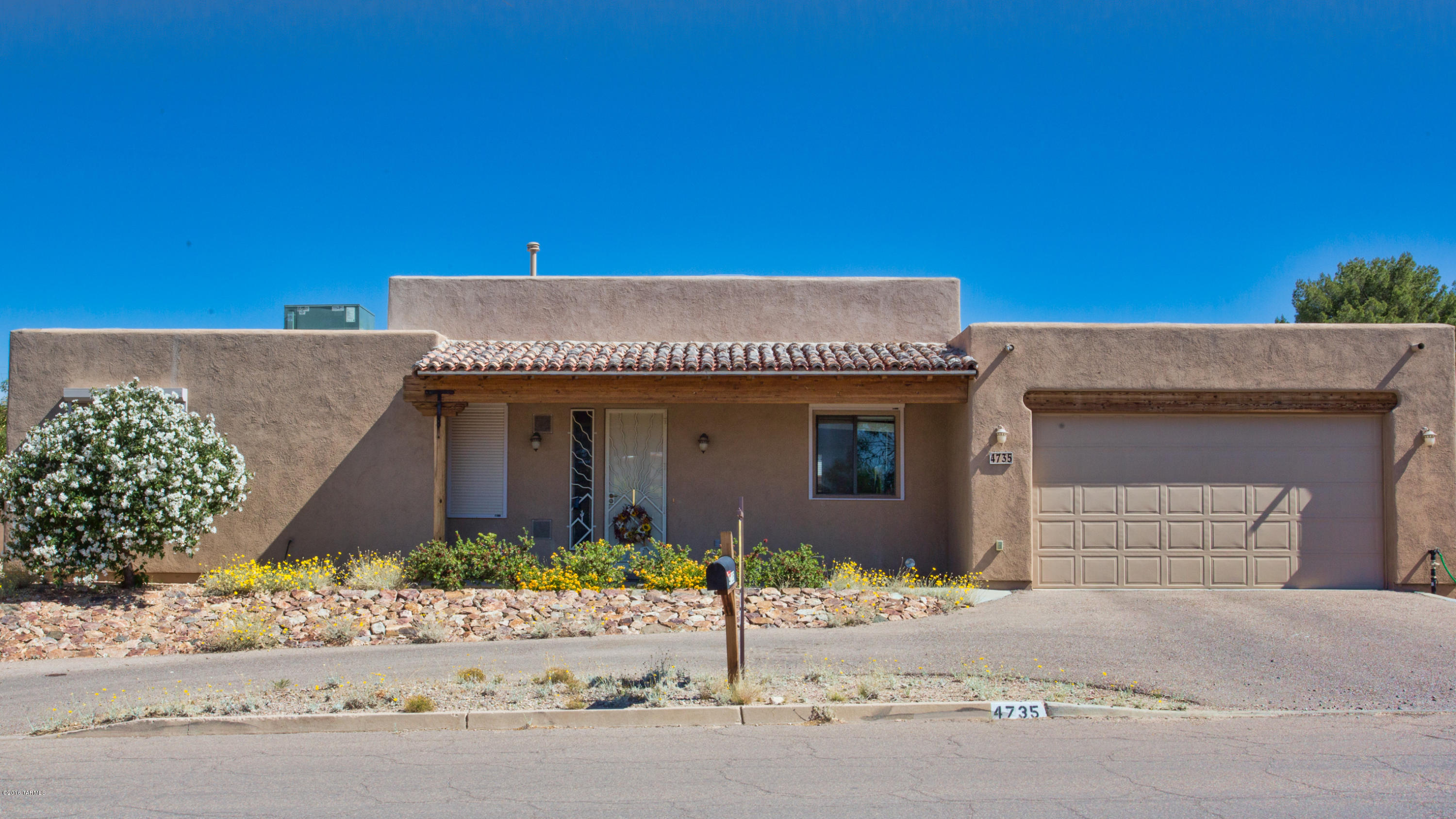 Seller will accept or counter offers between $250,000 and $260,000. Centrally located modern home has all conveniences of new construction. 4 bedrooms, 3 total baths (2 full & 1 - ¾), built in 2007,  2 car garage, concrete floors, split floor plan, open kitchen/great room concept with vaulted ceilings & cozy gas fireplace. Huge master suite with exterior door to backyard and tons of natural light. Master bath boasts dual sinks, separate garden tub, oversized shower, separate commode and a large walk-in closet. Convenient laundry room with extra storage. Automated rolling shutters throughout for security & light control. Professionally landscaped yards, rear yard has intimate covered patio perfect for entertaining, citrus trees and tons of flowering plants.