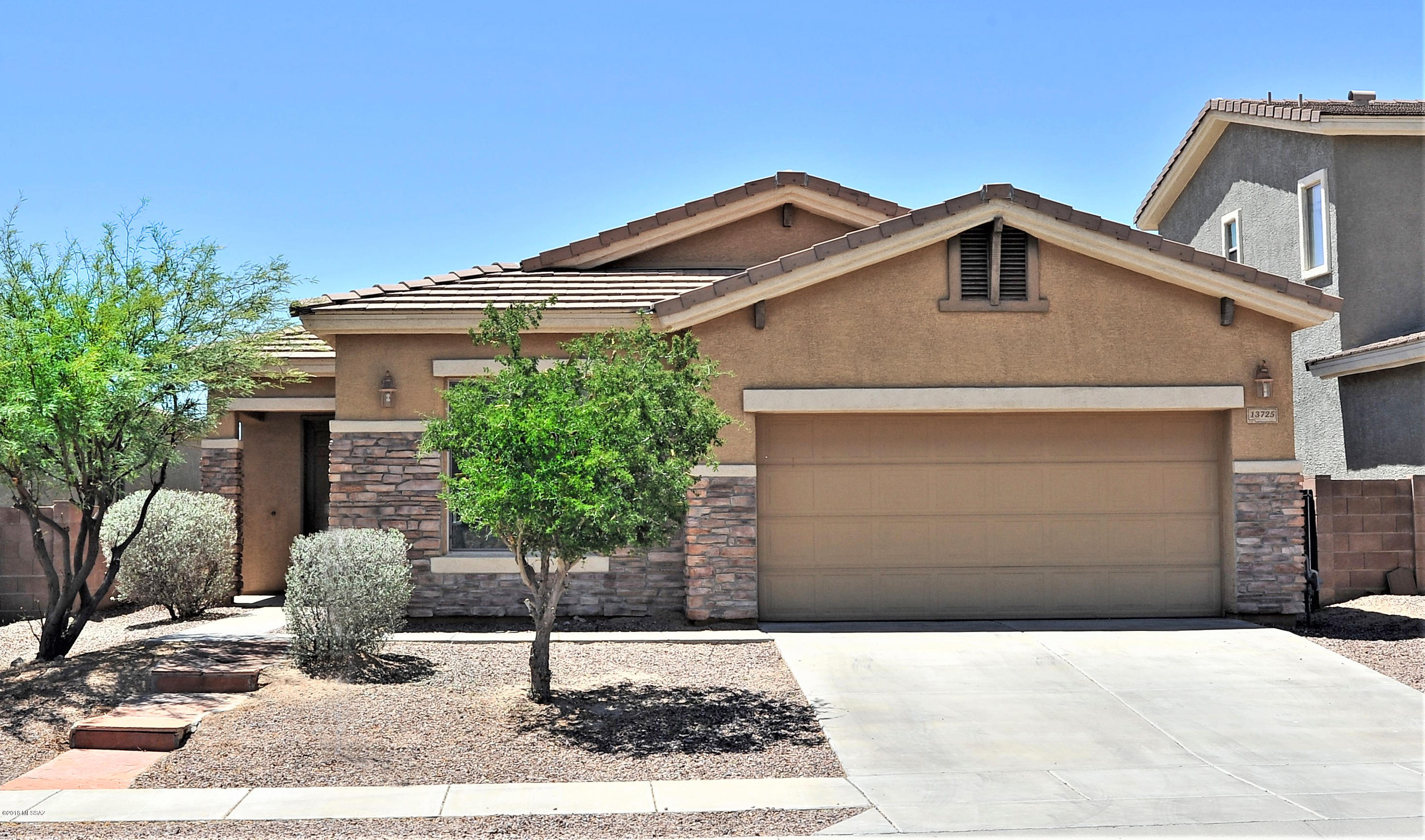 This 5 bedroom home has an open kitchen with lots of cabinetry. Granite counter tops, An Island with under-mount sink and pull out faucet. Built in Microwave, gas stove, Side by Side fridge. Open floor plan, ceiling fans in all of the rooms. Master bedroom suite offers a garden tub, walk in shower, dual sinks and walk in closet. Guest bath also has dual sinks. Large laundry with upper and lower cabinetry and counter top. Close to the market center, hospitals, shopping and restaurants. Upgrade also include stone veneer on exterior columns, covered patio with extended brick pavers, block wall, tile roof and of course Mt. Views.
