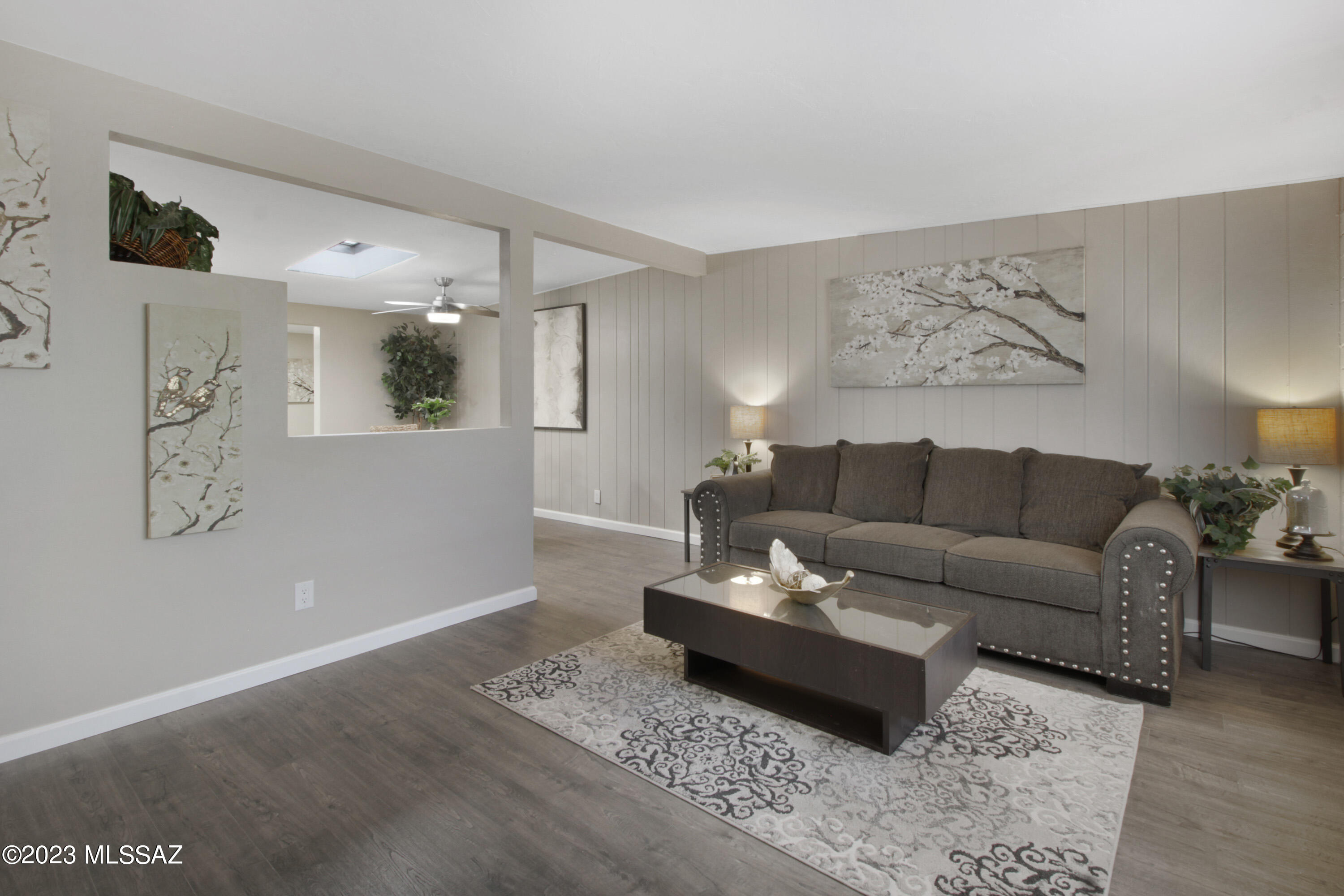 Range priced $210,000-$220,000. Beautifully remodeled end-unit townhome with 2 bedrooms, a full bathroom, and a den efficiently spread over 907 SF. Enjoy the modernized kitchen with granite counters, subway tile backsplash, stainless steel Whirlpool appliances and sink. New wood-look LVP in the common areas and new carpet in the bedrooms tie in nicely with new two-toned paint, doors, hardware, baseboards lighting fixtures, bathroom surround, toilet and more. The addition includes a den and large laundry room with storage shelves. The spacious backyard has been landscaped with new gravel and covered with bamboo privacy screening. Great home or rental property. Come. See. Stay!