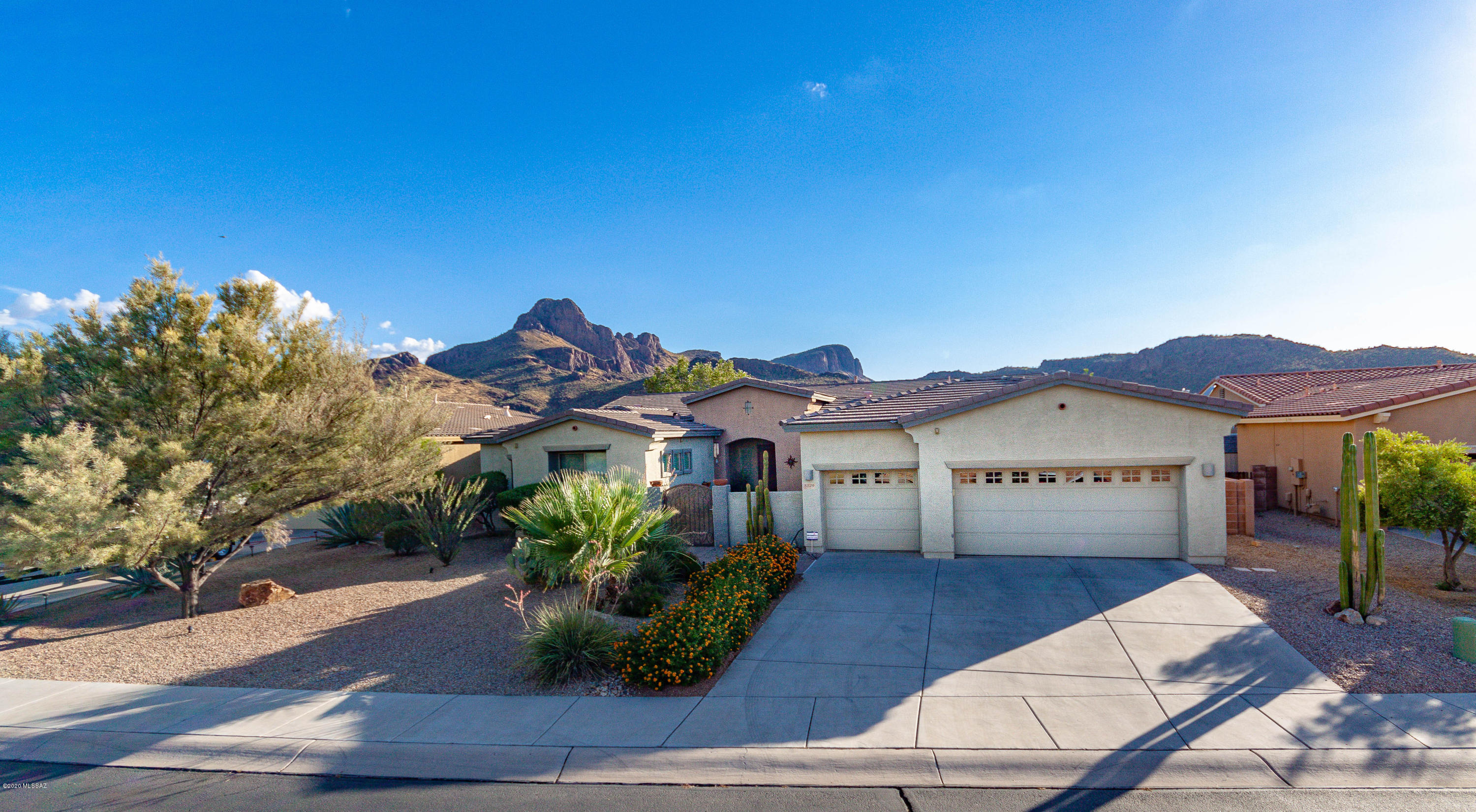 PREPARE TO BE WOW'ED! Spectacular 4BR/2.5BA + Bonus Room (Office/Den or possible 5th BR), 3-Car Garage, Pool, Spa with Waterfall & Incredible Views of Sombrero Peak! Meritage Built Contemporary w/Gated Courtyard Entry on Premier/Private, Oversized .33 Acre lot in Gated Ironwood Reserve. Cook's Kitchen w/Slab Granite Counters, 42 inch Maple Cabinets, Double Oven, Gas Cooktop, Huge Island, & Built in Work Desk. Family Room w/Gas Fireplace + Entertainment Center. Awesome Living Room/Dining Room w/Picture Windows framing Mountain & Sunset views! Split BR Floor Plan, perfect for Extended Family. Spa Like Master Suite w/Slider to Patio area. Separate Garden Tub/Shower + Large Walk-in Closet w/built-ins. Custom Window Coverings, Plantation Shutters, Water Softener, + Alarm. Just waiting for YOU!