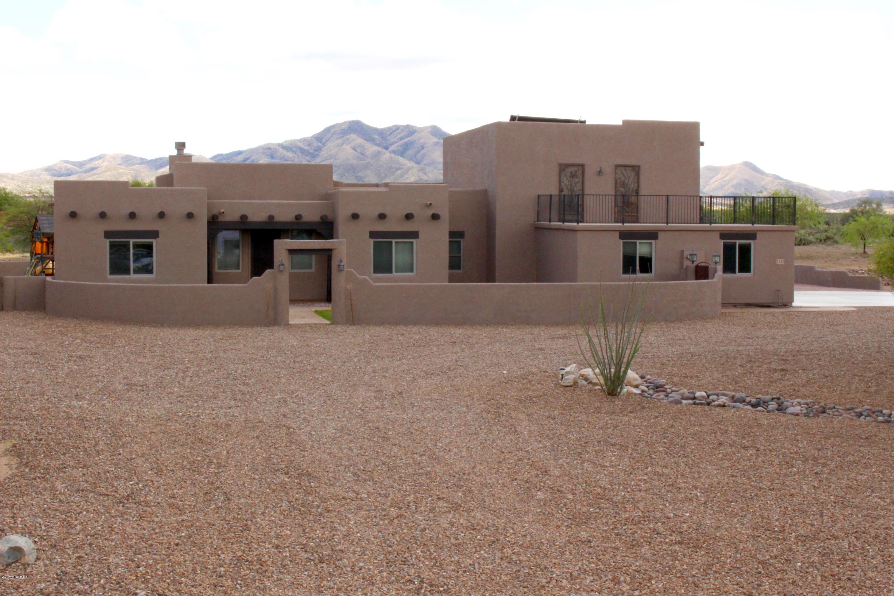 Fantastic home on a cul-de-sac surrounded by natural desert! This home features a nice front courtyard with grass, new landscape rock and plenty of parking with extra room for an RV, trailer and toy haulers. Inside, you will find brand new carpet, large porcelain tile, ceiling fans, solar water heater and newly painted walls. The kitchen has granite with stainless appliances, including a newer double convection oven, built-in microwave and brand new glass cooktop. For entertaining, the outside has a nice pool & spa, grass, block/ stucco/rot iron wall with the property line extending beyond it. The yard also boasts an area with a working pizza oven and firepit with seating! To top it off, the exterior of the home has just been painted and the roof newly re-coated. Welcome home!