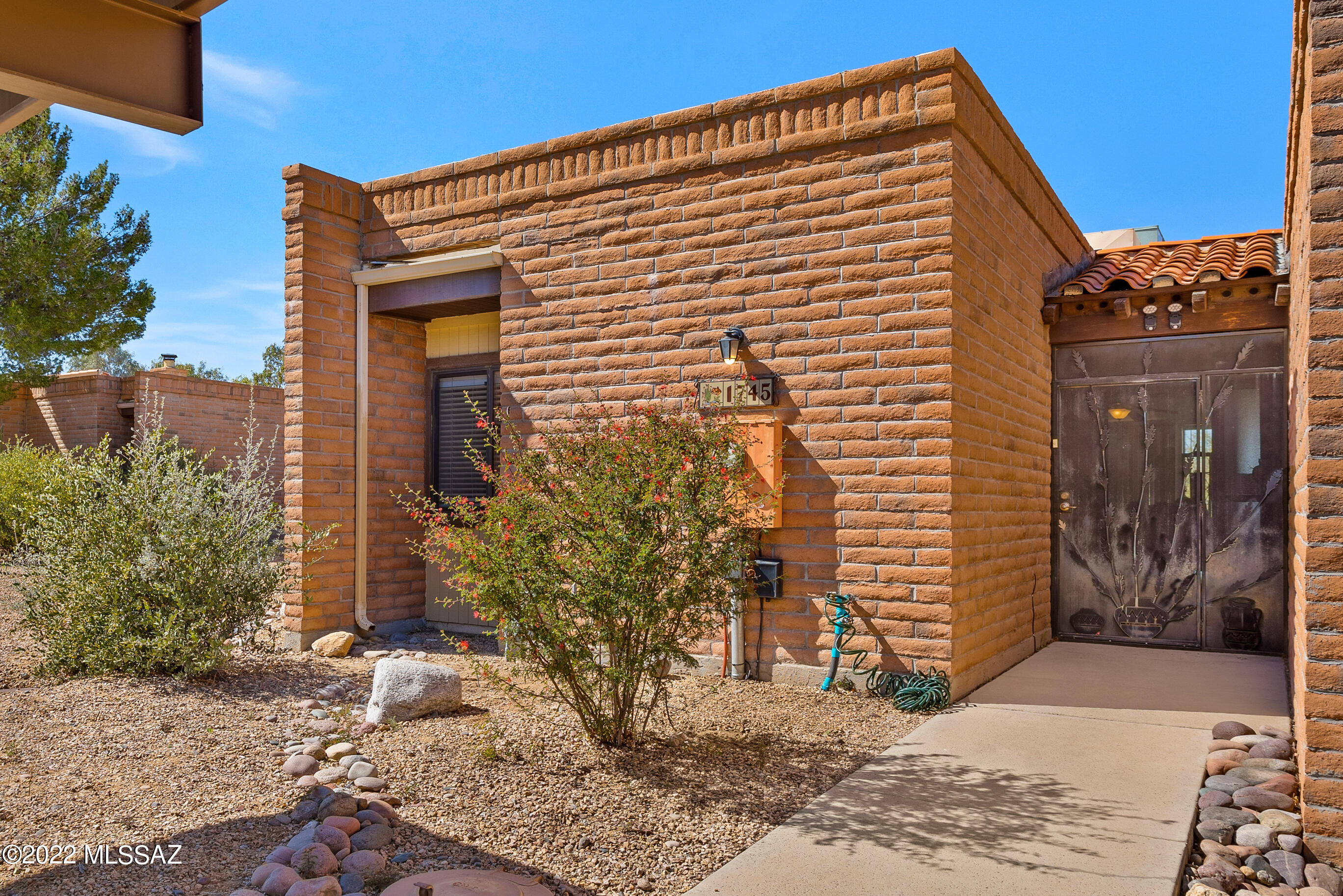 Darling 2 bedroom 2 bath masonry constructed townhome on a private corner & elevated lot. A fantastically sited townhome with views off to the west which means your sunset views are AMAZING! This split floorpan in the ever popular Fairfield La Cholla Hills is sparkling clean & ready to move right into. The spacious living room has a lovely view of the Tucson Mountains & leads right out to a lovely west facing patio for, again, those amazing Tucson sunsets! Sizable bedrooms with great storage. Lots of natural light throughout. La Cholla Hills is an active adult community of 55+ with fabulous facilities to include two pools & spas, tennis & pickle ball courts, shuffle board & bocce ball amongst so much more! This lovely home is quiet, private & ready to be your next new home!This won't last!