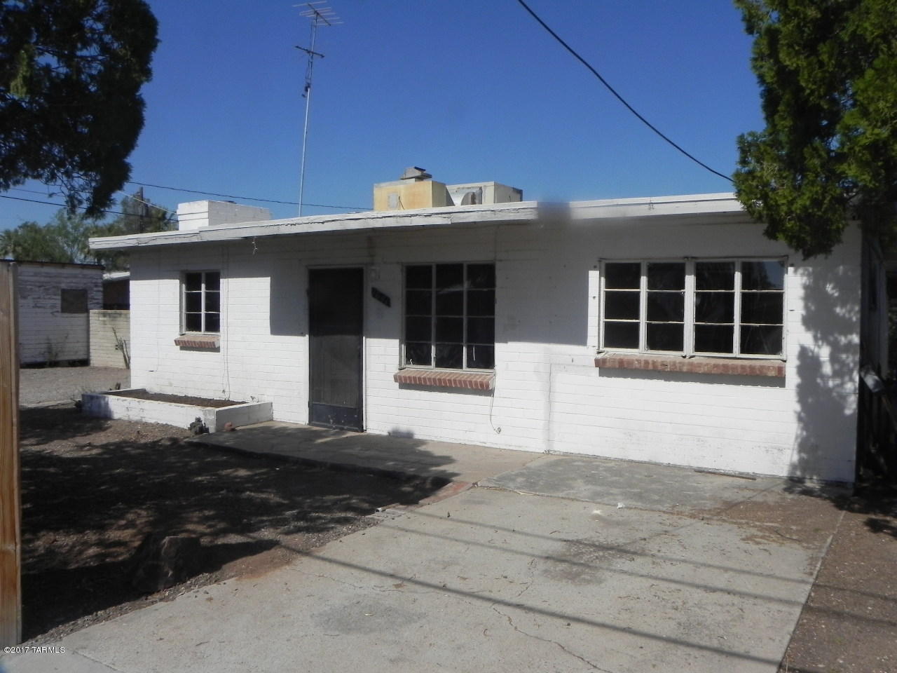 Great opportunity with this centrally located two bedroom, one bath home. Established neighborhood. Spacious living room with a fireplace and separate dining area. Large fenced in backyard. Plenty of room for storage. Close to schools, shopping, and public transportation. Come see today! This property offers unlimited potential! This is a Fannie Mae HomePath property. First Time Buyers, complete the HomePath Ready Buyer Ownership Course. Attach certificate to offer and request up to 3% closing cost assistance. Ask Agent for more details. Restrictions apply.