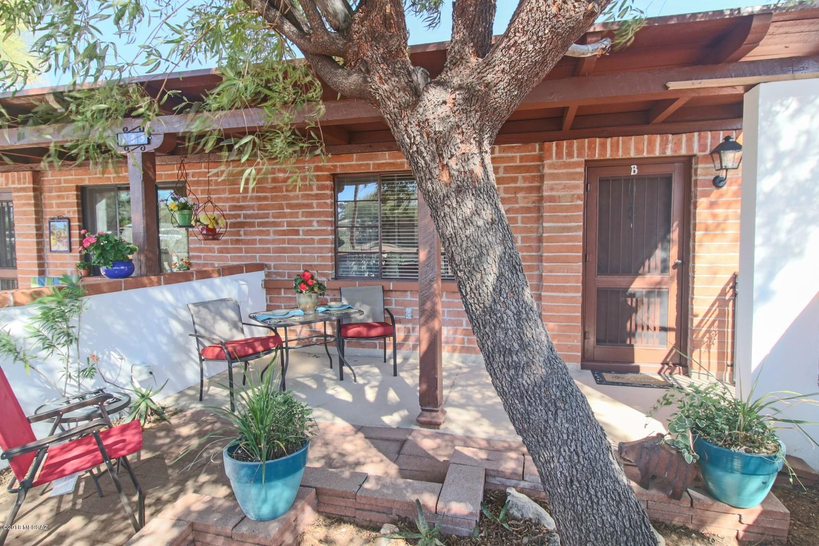 Rare find, 1 bedroom end unit in Villas West. Enjoy the tranquil location of this unit as you watch the sunset from the front patio. Charming turn key villa features updated kitchen with full size stove and refrigerator. Updated bathroom with washer/dryer included. Furnishing and housewares available on SBOS for $1,700. HOA covers water, trash, HVAC, water heater, units exterior and amenities. Villa does have GVR.