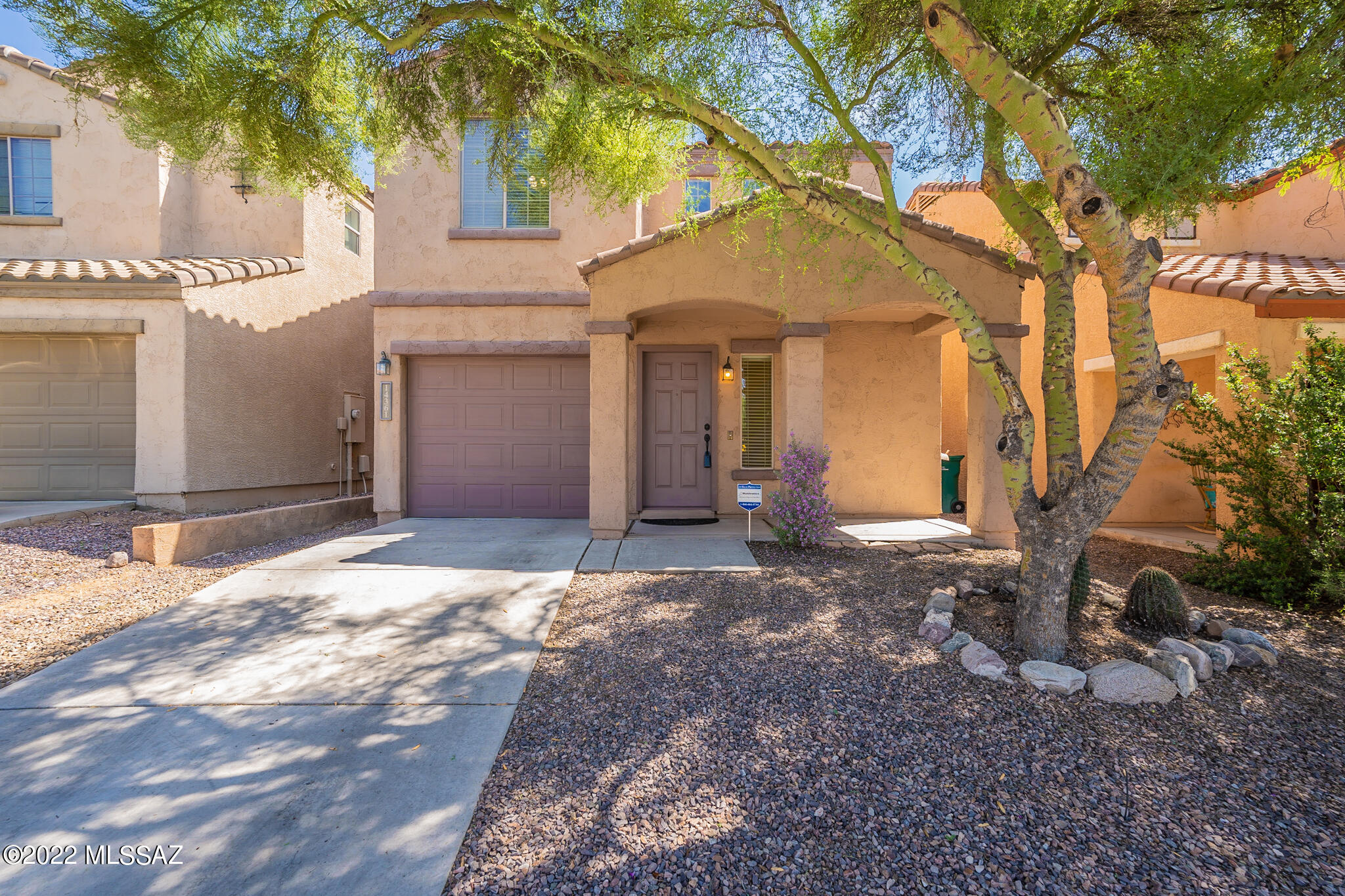 This home is ready for backyard BBQ's and family get togethers! Beautiful tile and laminate floors plus freshly painted. 3 bedrooms and 2 baths upstairs, 1/2 bath downstairs, and 2-car tandem garage. Rancho Sahuarita offers many different activities, parks, and pools. Wonderful shade trees in the front and back.