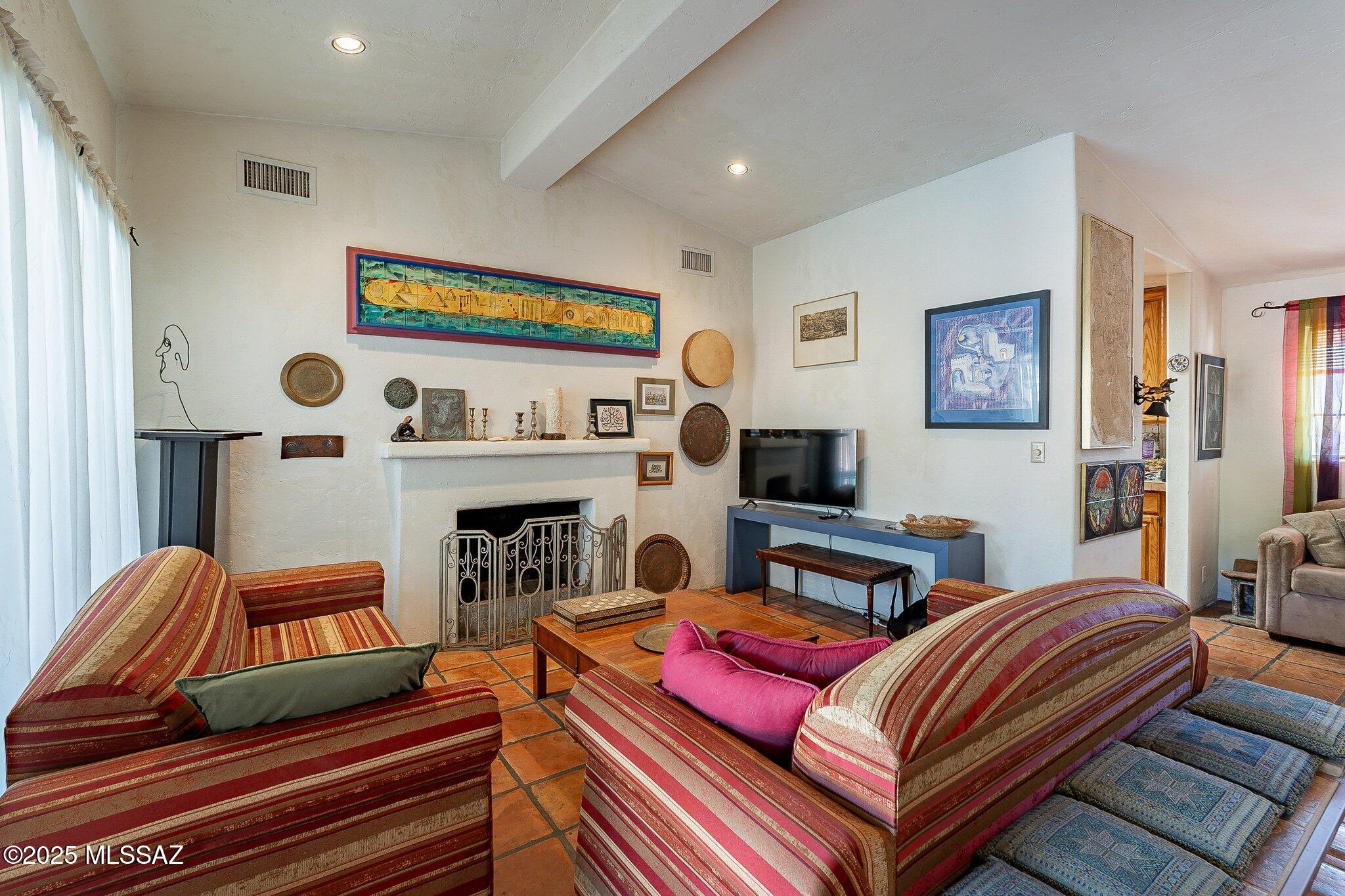 *SELLER WILL ACCEPT AND COUNTER OFFERS BETWEEN $574,900 AND $585,000.  This Premier Estate combines the rich history of Tucson and the feel of a Tuscan Villa. Your Estate will be nestled in the heart of El Montevideo Estates giving you one of the rare opportunities to join this highly desired neighborhood. Your Estate's compound walls give you 360 degrees of privacy while enclosing garden areas, a fountain, an artist studio/workshop, and an exceptionally large, covered patio wrapped around a sparkling pool. Inside the estate you will find soaring ceilings, millwork beams and handmade Saltillo Tile. The Central location gives you easy access to Downtown, the Historic Districts, the U of A, and even walkable shopping at the El Con Mall. The location, the neighborhood, and the Estate itself are truly a rare find.