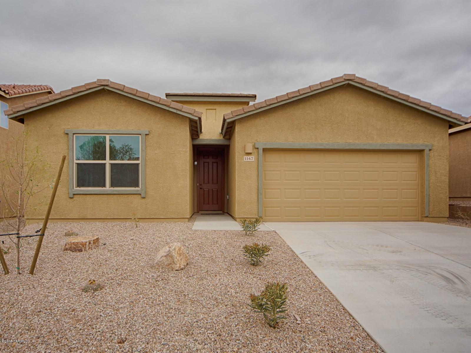 Brand new energy efficient home ready for move in now! The Mambo features a spacious kitchen with large center island, Sunset Gold granite countertops and Maple cabinets with Cognac stain all open to the dining area and welcoming Great room. The secluded Master suite boasts a huge walk in closet and spa inspired bath with his and hers sinks and soothing soaking tub. The additional bedrooms are split from the Master for added privacy. Enjoy the wonderful Arizona weather on your cozy covered back patio. Love life living at Promenade, Madera Highlands with the sport courts, park, playgrounds and pool. Known for their energy efficient features, our homes help you live a healthier and quieter lifestyle while saving you thousands on your utility bills