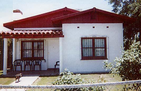 3BR main house with fireplace, 2BR guest house (not included in sq.ft.), storage shed, brick BBQ, mature vegetation, laundry porches, ceramic tile throughout, strong rental history. Utilities paid by tenants. Property sold as is, where is. Owner has never occupied property. No insurance claims in last fifteen years.