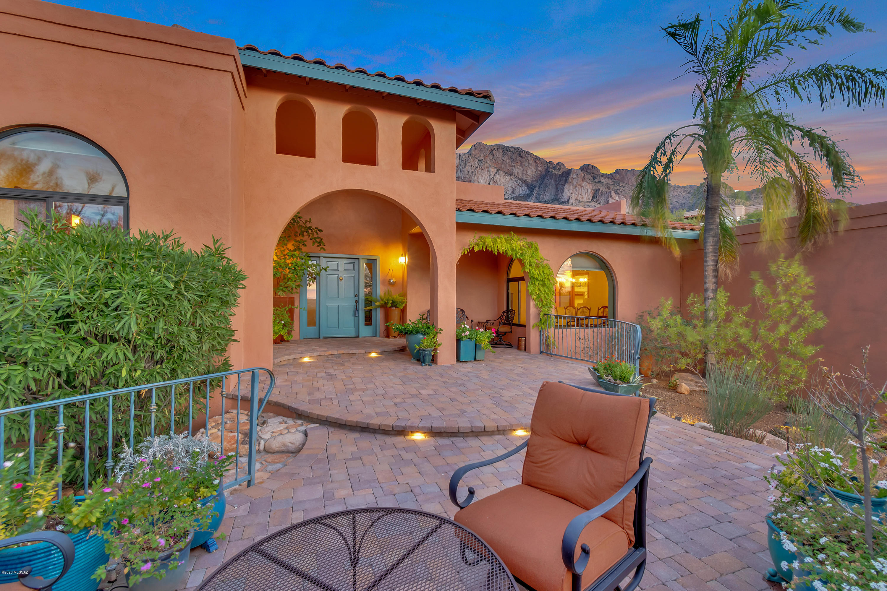 Dramatic panoramic views of Pusch Ridge, sunsets & city lights. Beautiful contemporary southwest design home w/solid block construction. Walk in to spacious great room w/14ft ceilings, Clerestory windows & striking view of mountains. Kitchen offers new stainless steel double oven & microwave, new granite/subway tile back splash, Kitchen Aid dishwasher & refrigerator and views from kitchen & breakfast nook. Master bedroom has separate office/sitting room. Great split floor plan w/huge bonus room/rec room. Zoned heat pump 1 unit new, owned solar system, new carpet, Pella windows & doors, security system & more. Elegant landscape & hardscape front & back. Relax & enjoy pebble tec pool & view from backyard patios or sunsets and twinkling night lights from front patio.