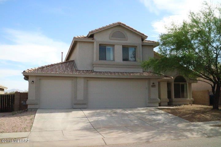 Tastefully Remodeled two level Home with 3 car garage and move-in ready. Warm & welcoming palette, soaring ceilings, beautiful tile floor, window blinds, plant shelves, upgraded lighting, bay window in living room & breakfast area, and sweeping stairway to 2nd level. Gorgeous granite kitchen counters, SS appliances, breakfast bar, tiled backsplash, upscale fixtures, desk area, pantry, and plenty of wood cabinets. Perfect Home for entertaining. Spacious family room with patio access. Generous size bedrooms, ample closets, and 3 baths. Vaulted ceiling in master retreat with private en suite. Enjoy the backyard covered patio, sparkling pool, and meticulous desert landscape. 1 or more of the owners is licensed to sell real estate in the state of AZ. Agent is related to 1 or more members of LLC