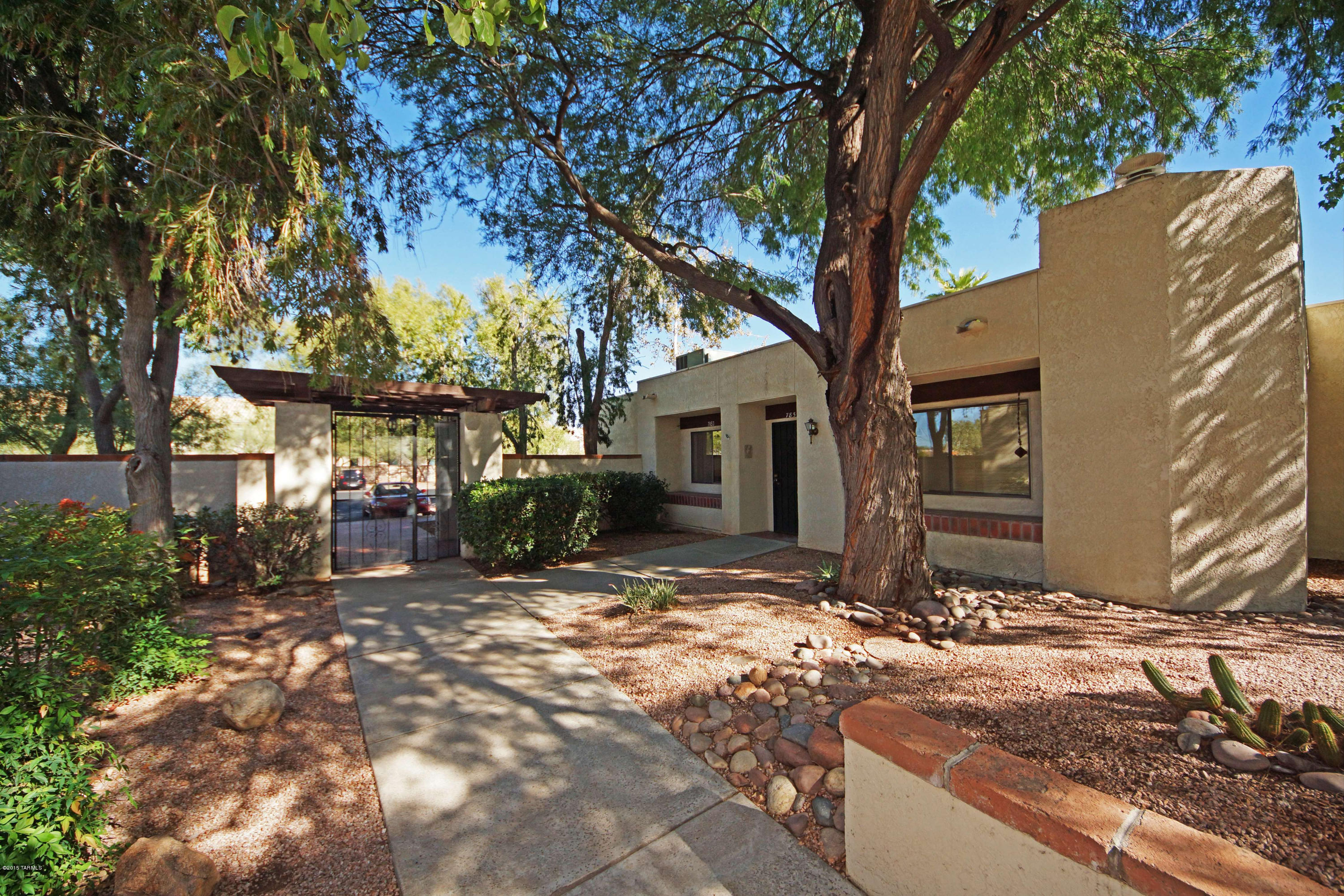 Super Nice 2 Bedroom 2 Bath Townhome with Den and Oasis-Like Common Area in Easy Access Near NW Location! Open the Door to the Very Spacious Great Room with Cozy Corner Fireplace! You'll Appreciate the Privacy the Split Bedroom Plan Offers and the Very Large Bedrooms!  Check Out the New Carpet, Fresh Paint and Wonderful Atrium with Waterfall! Swim Laps in the Pool, Relax in the Spa or Stroll the Lush Park -Like Grounds Complete with Bubbling Fountains!