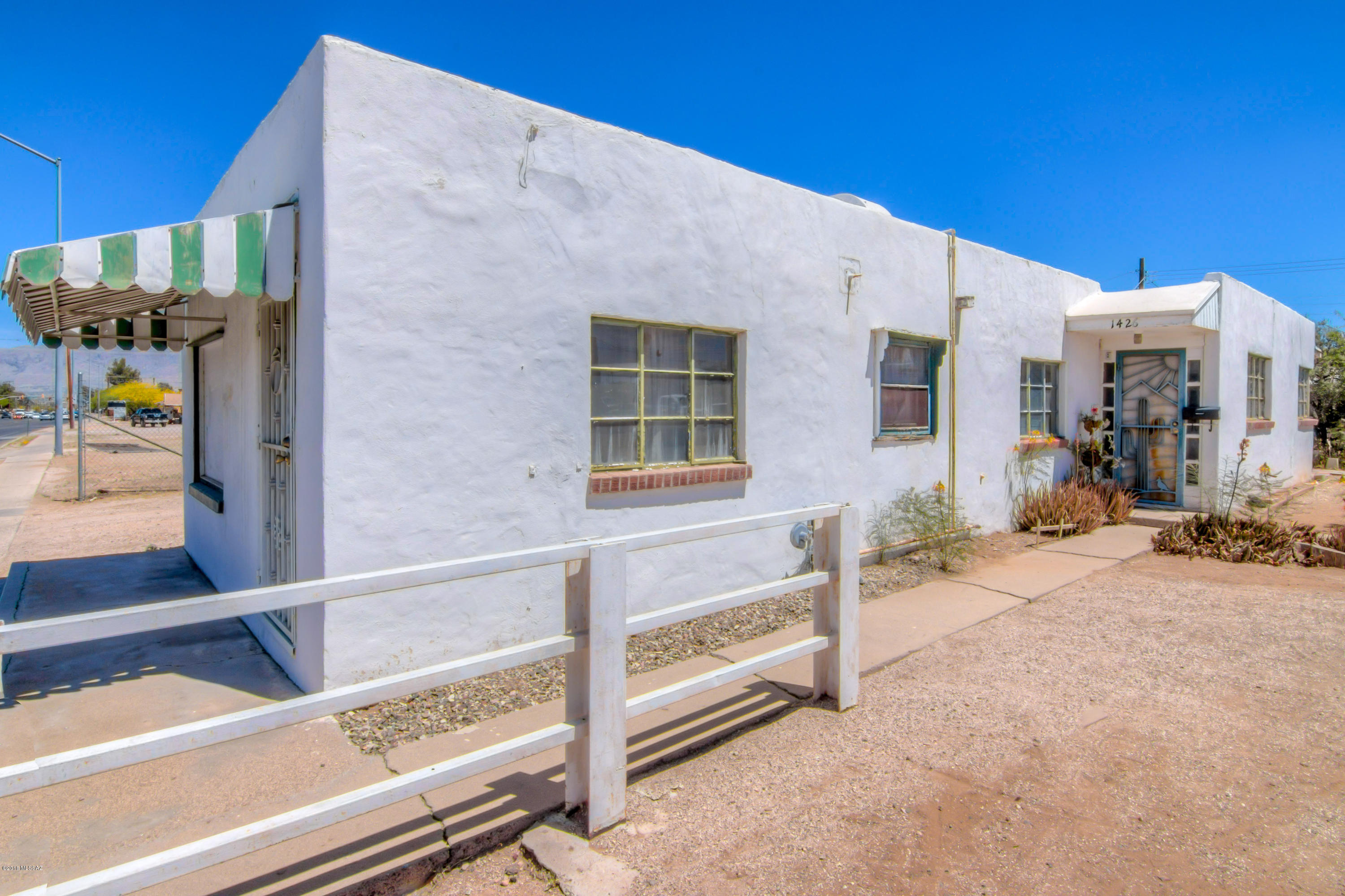 Central fix-up home. Ideal central location to be anywhere in Tucson fast! Huge workshop in rear of property that could be used for many things. Possibility for commercial use through rezoning. owner/agent