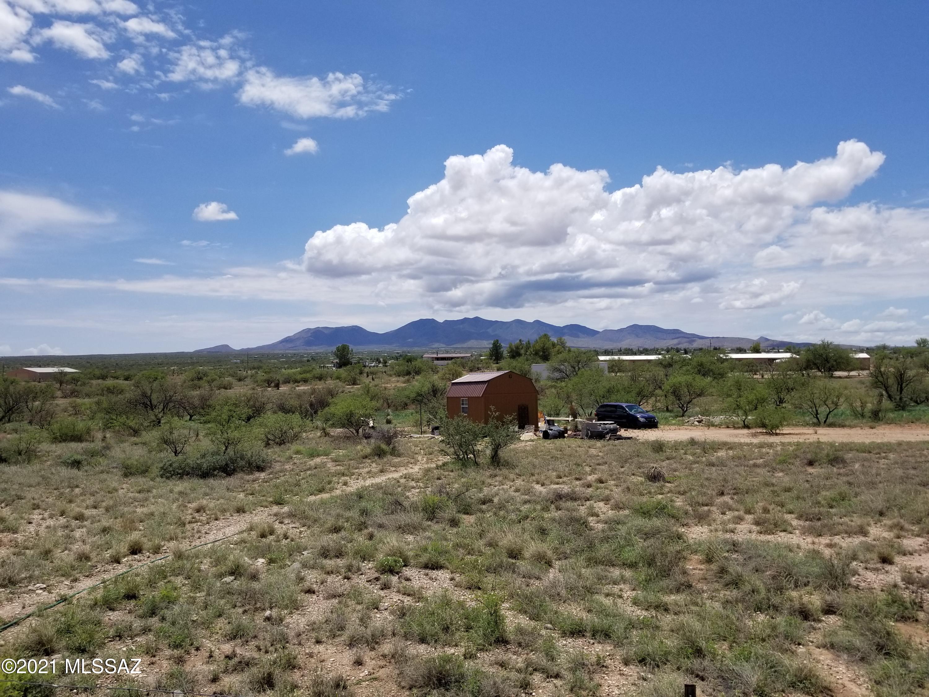 4.7 acres with water available and electric at the lot line. Mountain views! Property will be sold with a 25% well share ownership.  Well house is located on the southwest corner of the property.