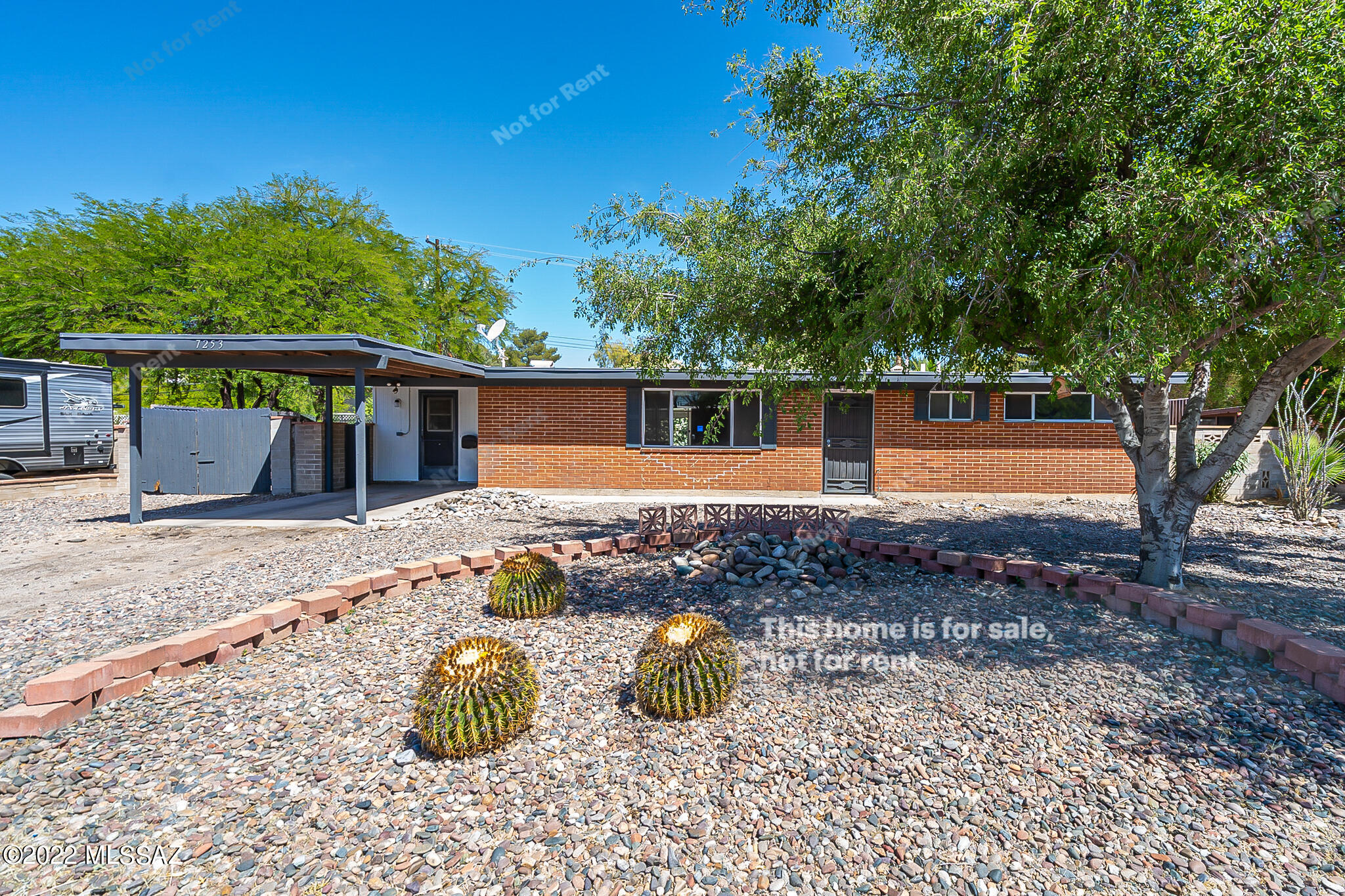Welcome to this 3 bedroom 2 bathroom home in sunny Tucson! Enjoy cooking in this kitchen complete with white cabinets, stainless steel appliances, and a stylish backsplash. Take advantage of days outside under the covered patio and nights next to the cozy fireplace in the living room. Step out to the backyard and swim in the private fenced in pool. Don't miss out on this incredible opportunity!