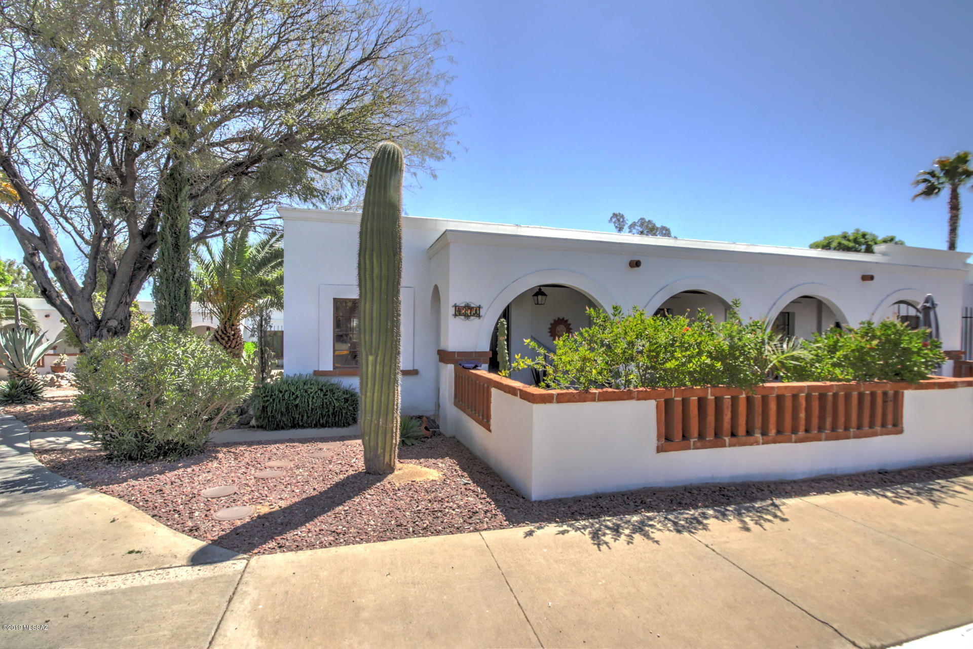 Nicely updated 2BR Villa that looks over the grassy area in Villas East. Satillo tile throughout, with a large tiled walk-in shower.  Very serene & quiet area with parking in front. Close to laundry, pool, restaurants, library & freeway.  Furniture SBOS.  FIRPTA applies.