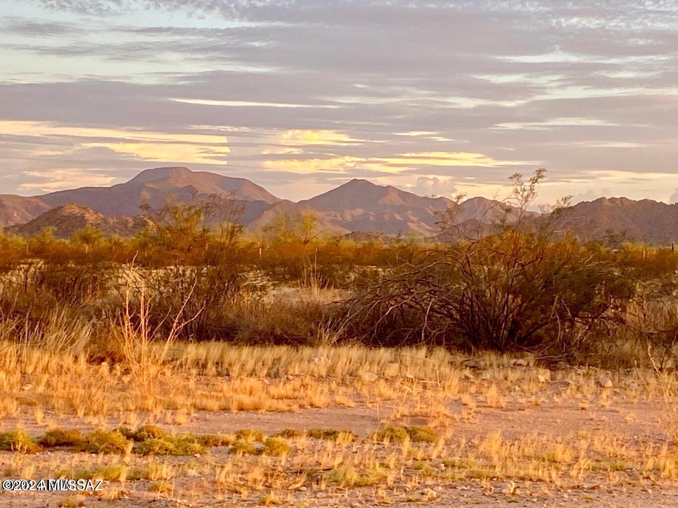 1.51 acres in rapidly growing Maricopa. Beautiful views of the surrounding mountains. Easy access off of Century Rd. with power
available on the property Rd. No HOA or CC&R's. Only 20 minutes from town, giving the feel of peaceful- rural living, while only being a short drive away
from tons of amenities & activities. Additional acreage available, SELLER FINANCING AVAILABLE.