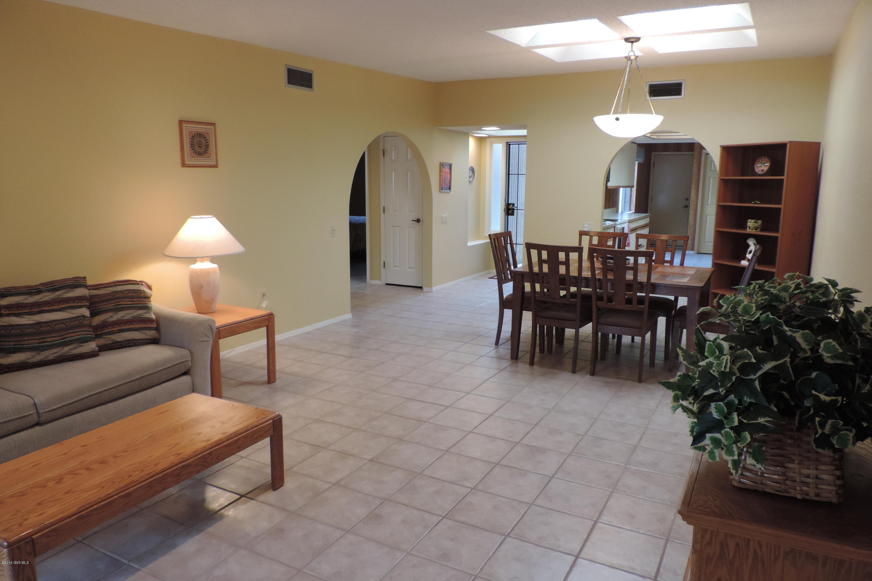 NEW PRICE & SELLER WILL PAY the $2,474 GVR CAPITAL INVESTMENT FEE !. GREAT DEAL...This 1344 sq, ft., 2 bedroom 2 bathroom home is move in ready ! Mountain Views enjoyed from your front patio. Encanto Estates is a friendly yet quite neighborhood with a convenient location to 3 GVR Centers.The pride of ownership is reflected in this well maintained property. END UNIT, ROOF RECOATED in (5/16), NEW HVAC (5/16), TILED throughout... Bright Open floor plan, SKYLIGHTS.. Retreat to your private back patio to enjoy nature. This property is is a great ''winter retreat'' or a year round residence.